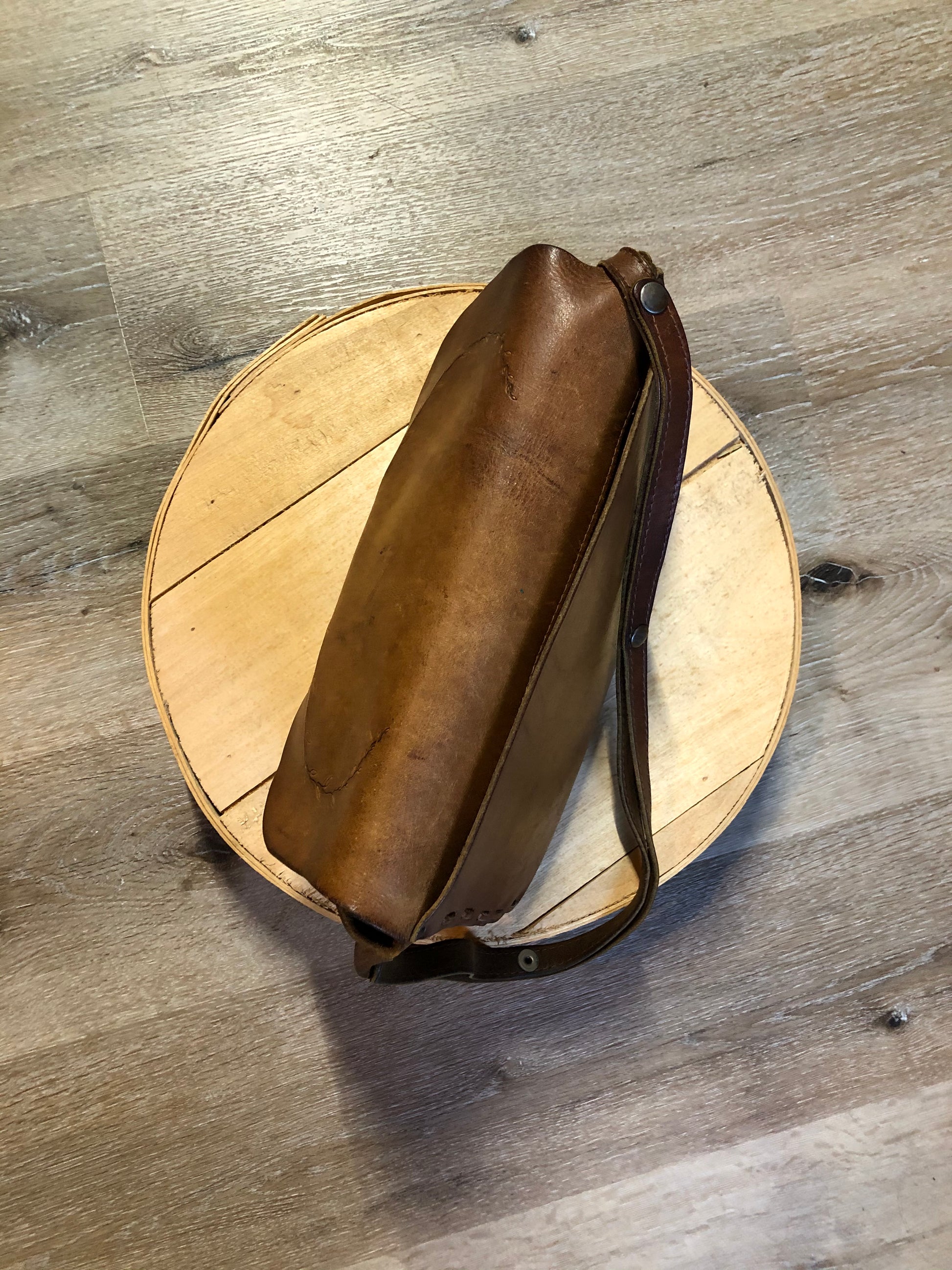 Kingspier Vintage - Hand tooled leather saddle bag with leather stitching, adjustable strap and brass front clasp.