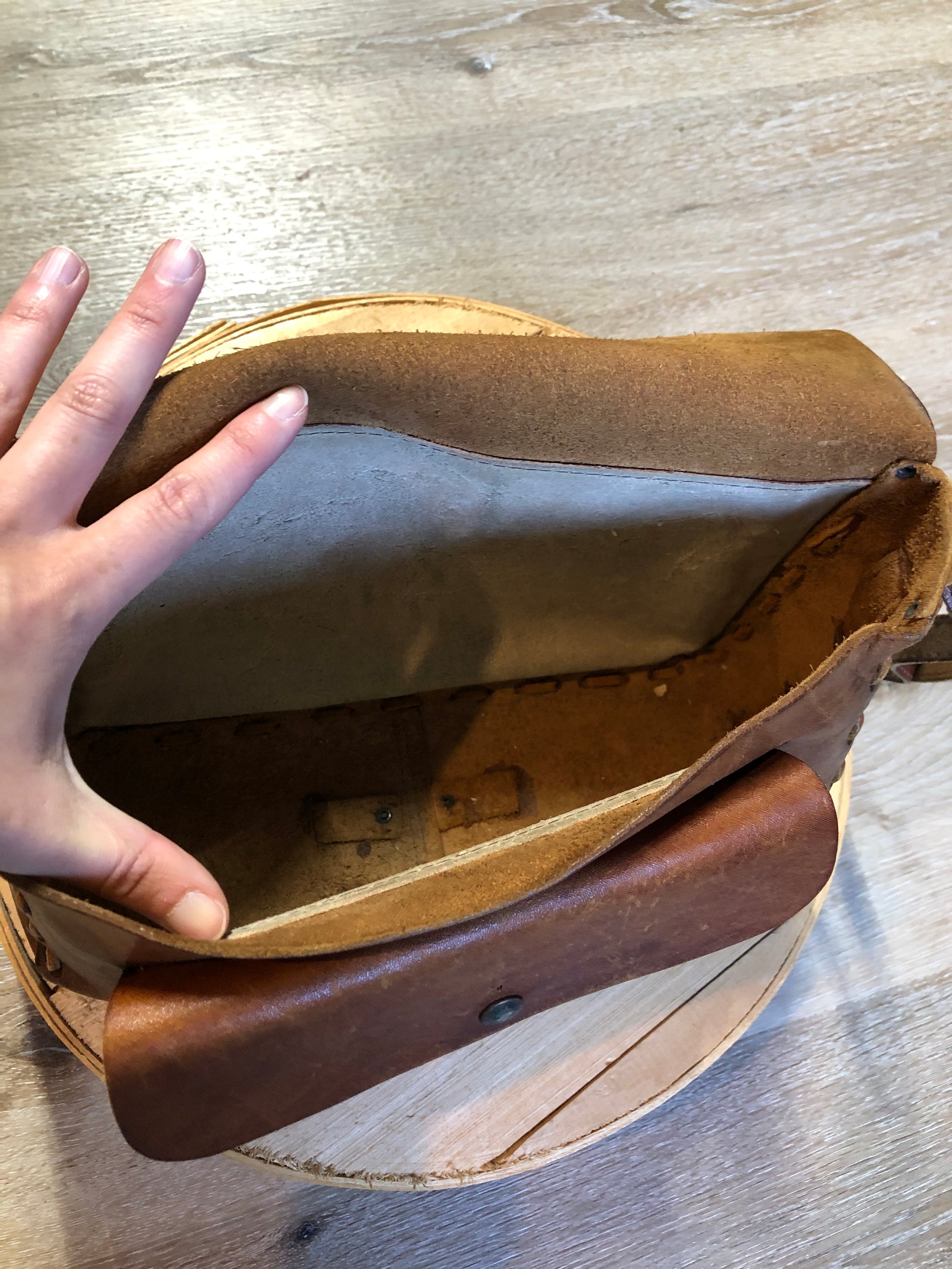 Kingspier Vintage - Hand tooled leather saddle bag with leather stitching, adjustable strap and brass front clasp.