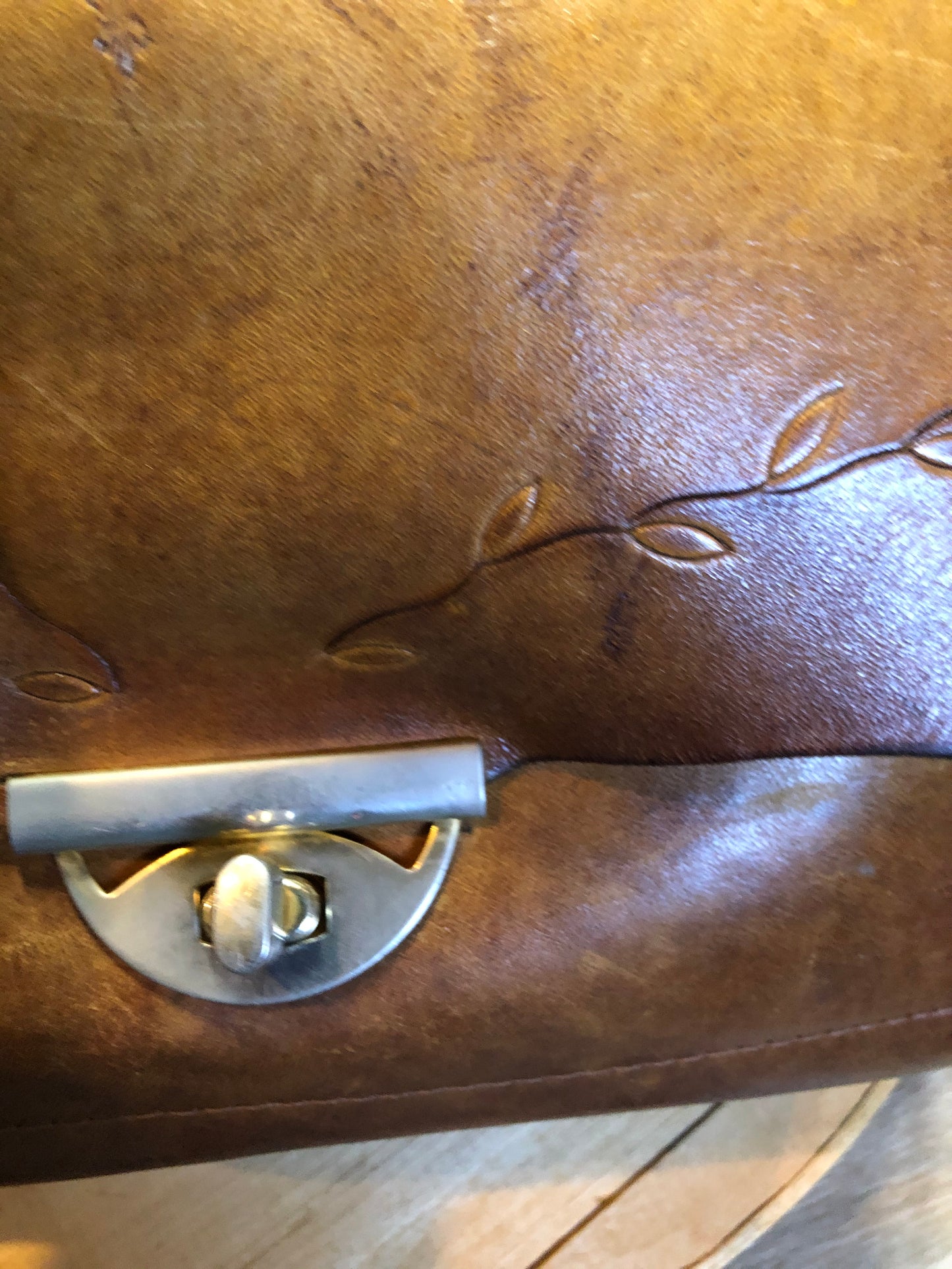 Kingspier Vintage - Hand tooled leather saddle bag with leather stitching, adjustable strap and brass front clasp.