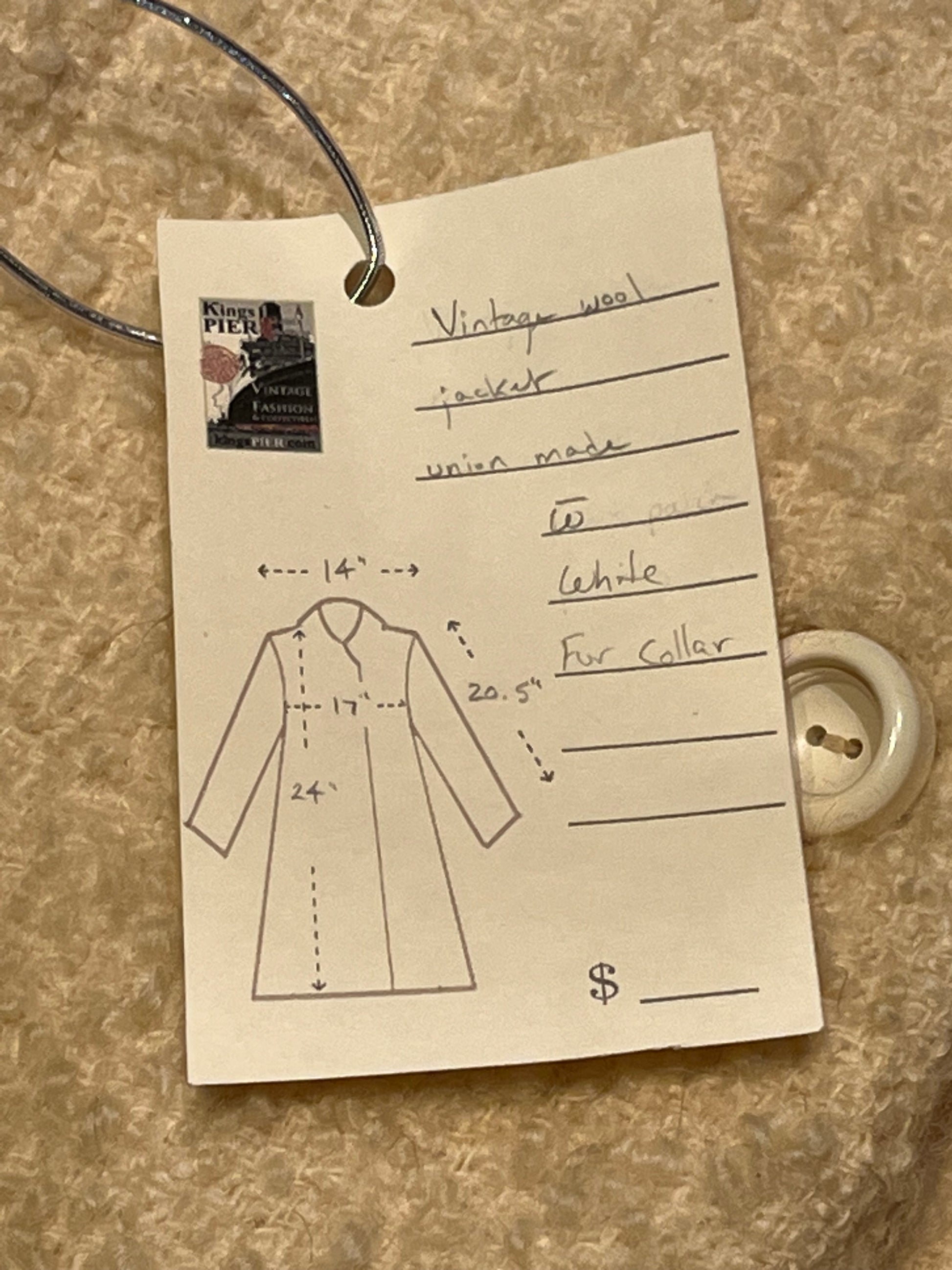 Vintage persian lamb white fur jacket with white Fur Collar, button closures and two front pockets.
Union made in Canada
Chest 34”