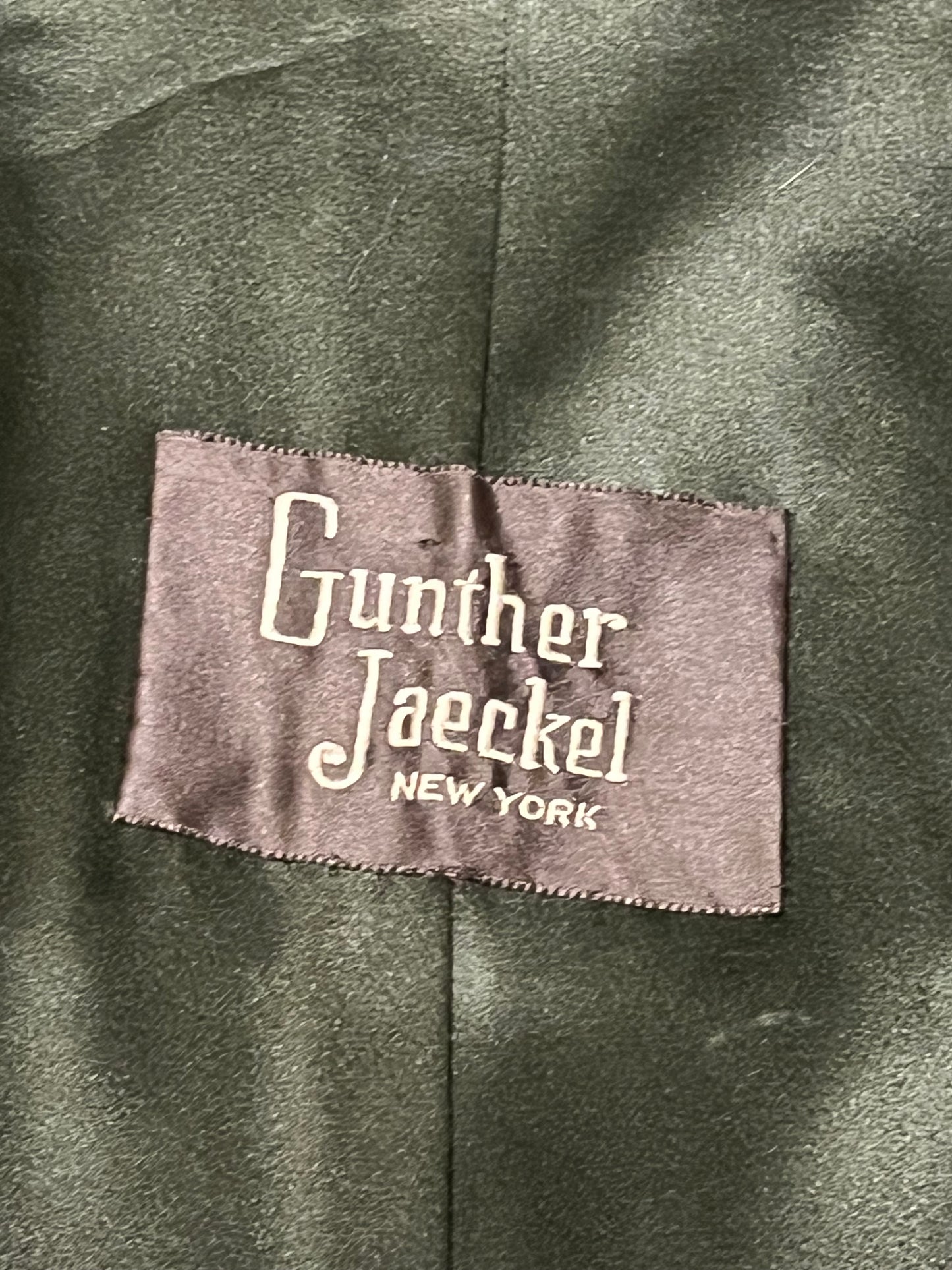Vintage Gunter Jackal New York fur jacket with hook and eye closures, two front pockets and a “J.C.D” monogram on the inside lining.
Chest 40”