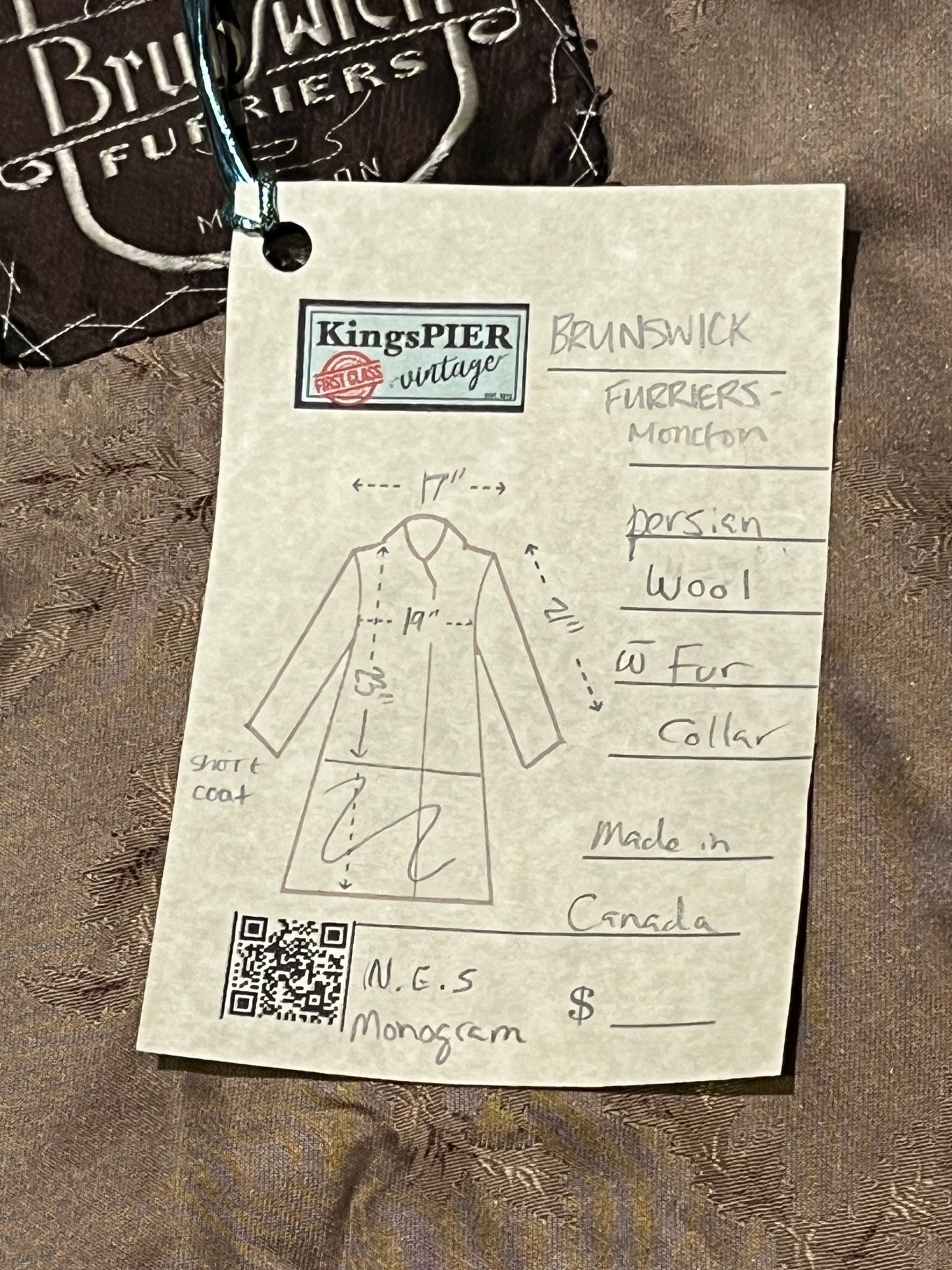 Vintage Brunswick Furriers brown persian lamb jacket with fur collar, two front pockets, flower decorated button closures and a “N.G.S” monogram on the inside lining.
Made in Canada, Chest 38”