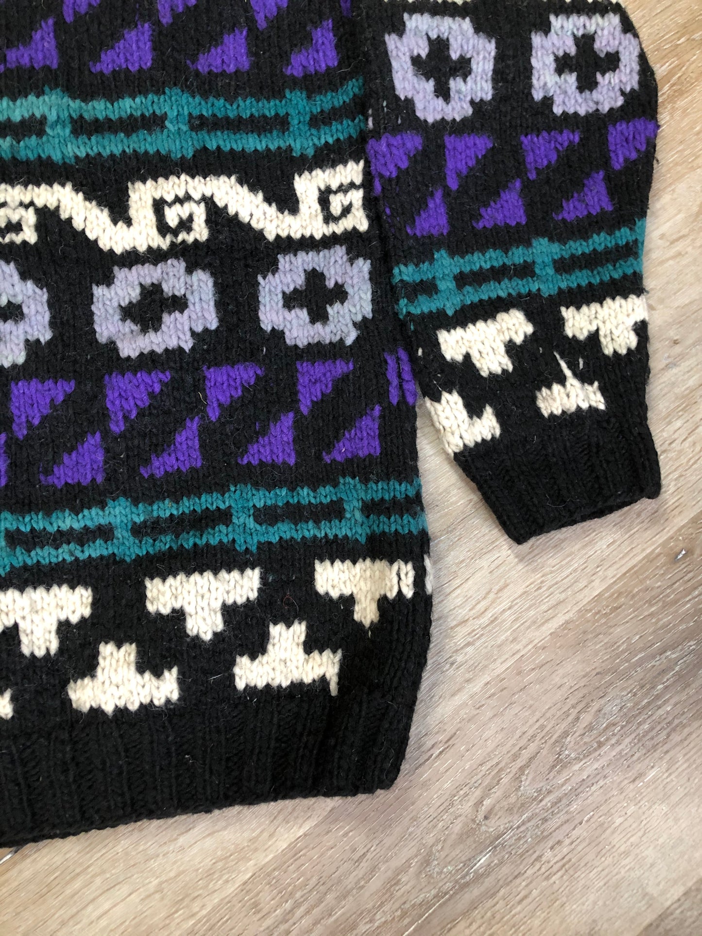 Kingspier Vintage - Amos & Andes Imports quarter button up wool sweater in black, purple, green and cream. Made in Ecuador. Size XL.