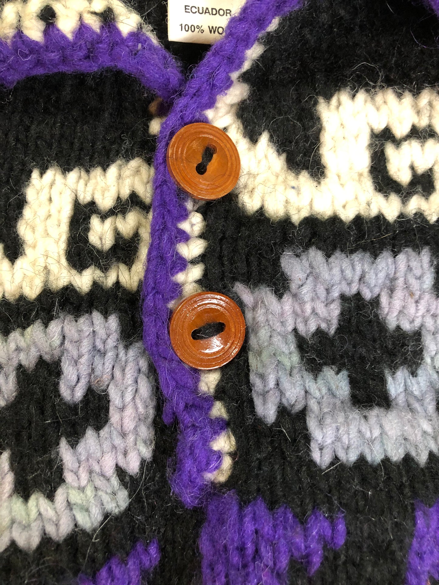 Kingspier Vintage - Amos & Andes Imports quarter button up wool sweater in black, purple, green and cream. Made in Ecuador. Size XL.