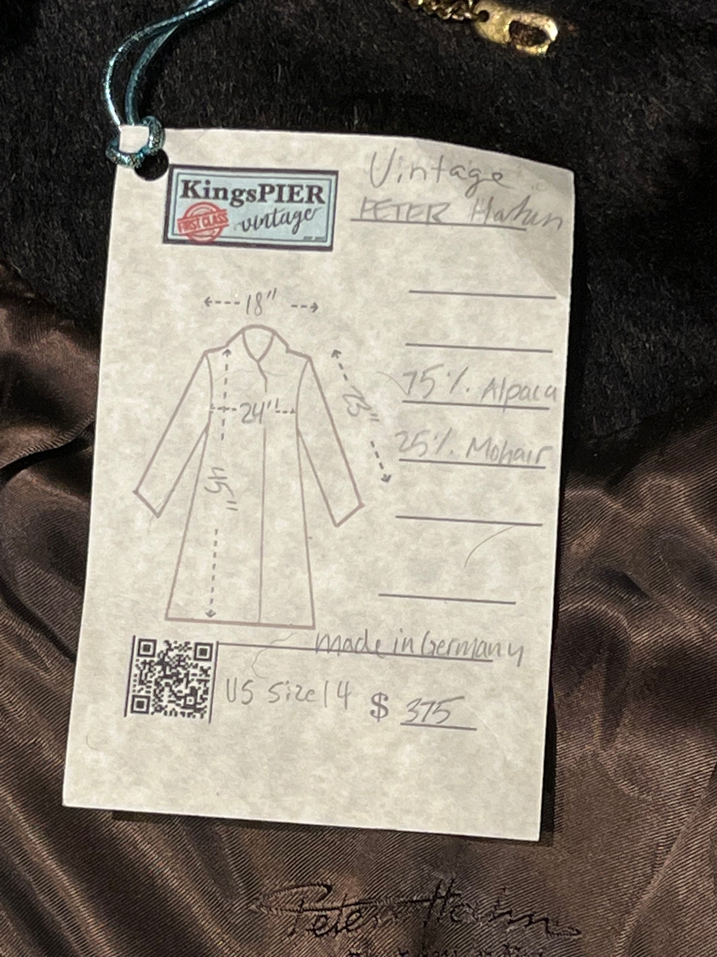 Vintage Peter Hahn long dark brown alpaca and mohair blend coat (75% alpaca, 25% mohair) with two front pockets, hook and eye closures and one button closure at the collar.
Made in Germany.
Size 14