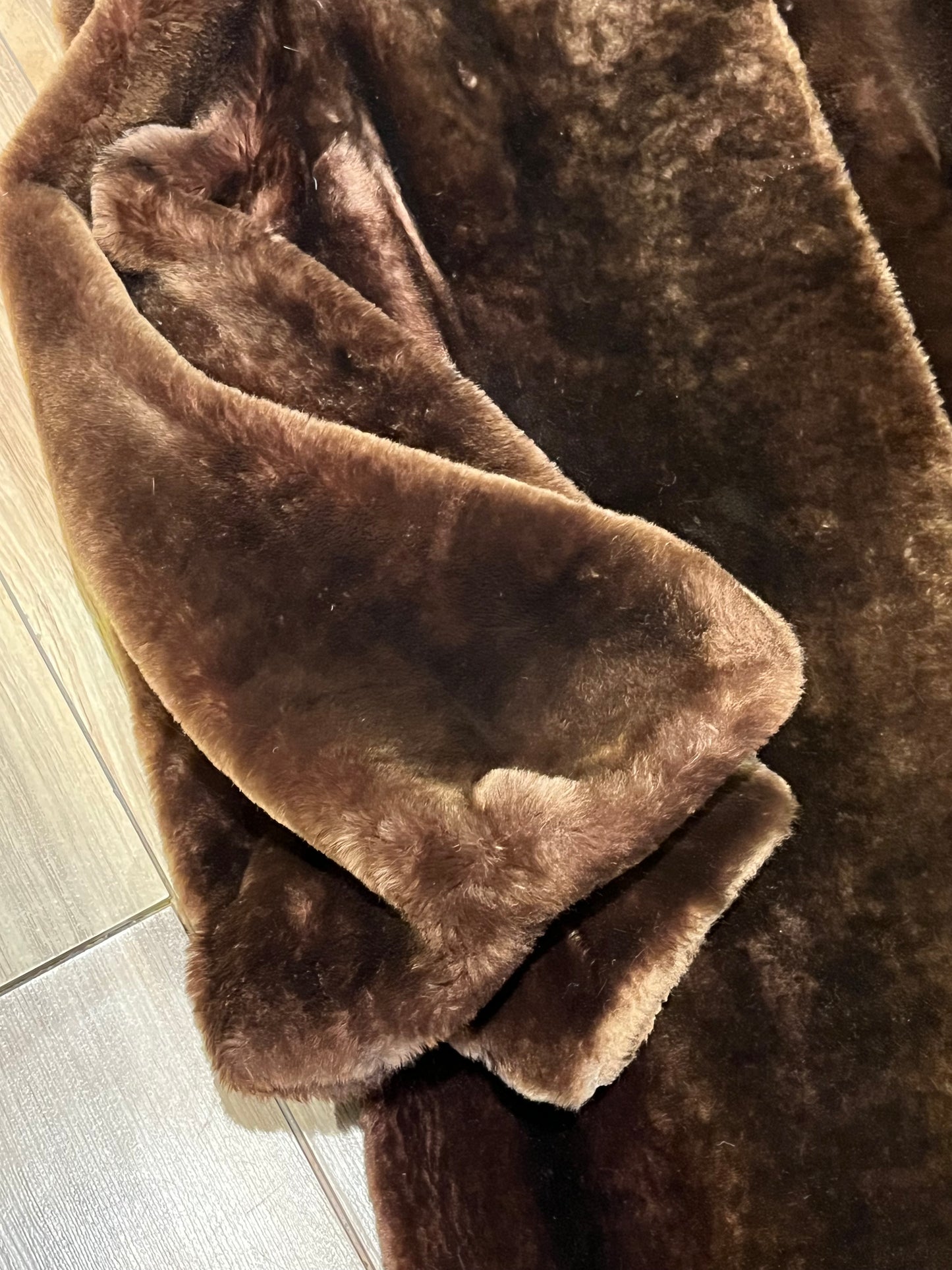 Vintage shorn beaver long fur coat with two front pockets, one inside pocket balloon sleeves and flower decorated button closures.
Chest 42”
