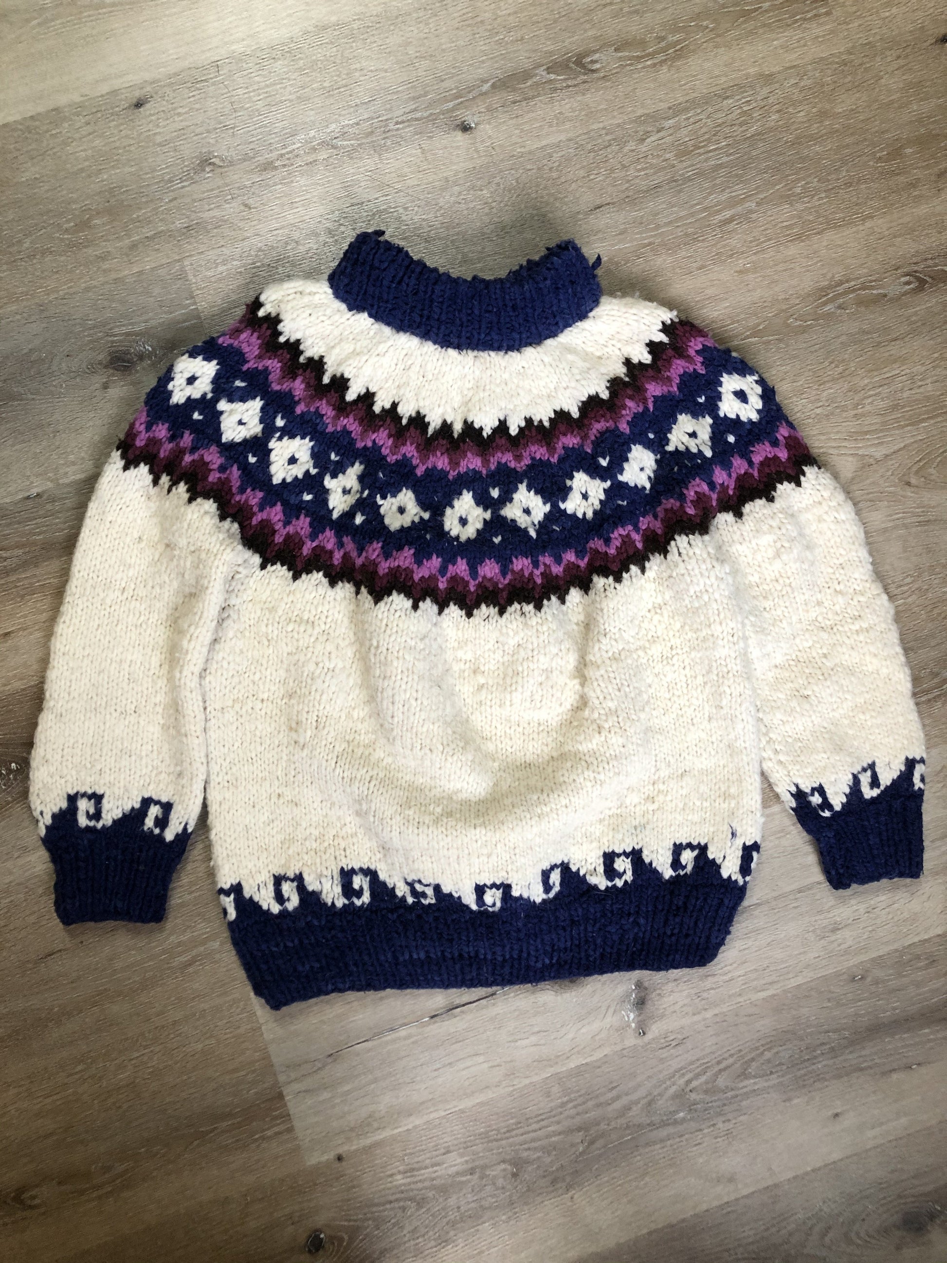 Kingspier Vintage - Vintage Handknit wool lopi sweater with white, navy, purple, pink and black design. Made in Ecuador. Size large.