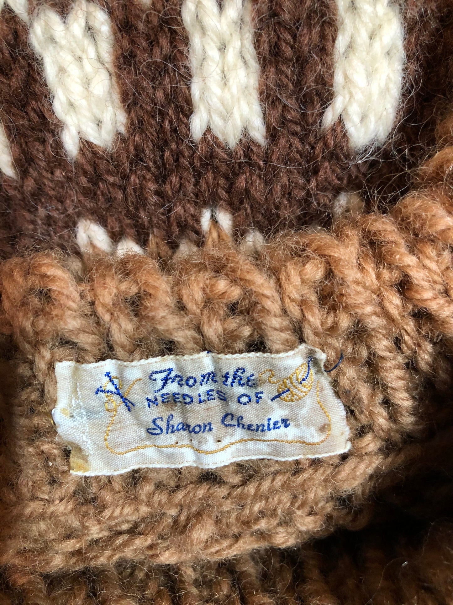Kingspier Vintage - Handknit lopi sweater with warm brown and white design. Fibres unknown. Made in Nova Scotia, Canada. Size medium.