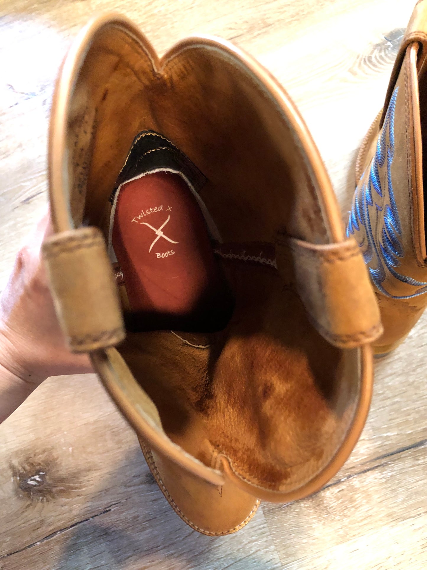 Twisted leather light brown cowboy boots with blue decorative stitching, leather lined with synthetic soles. Size 10M, 12W US/ 43 EUR