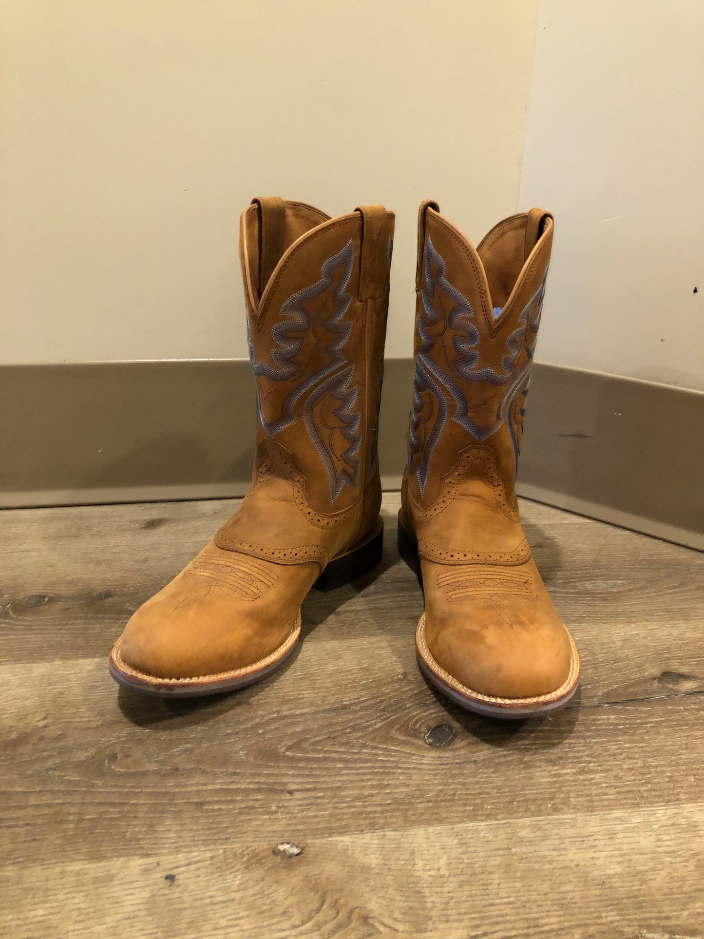 Twisted leather light brown cowboy boots with blue decorative stitching, leather lined with synthetic soles. Size 10M, 12W US/ 43 EUR
