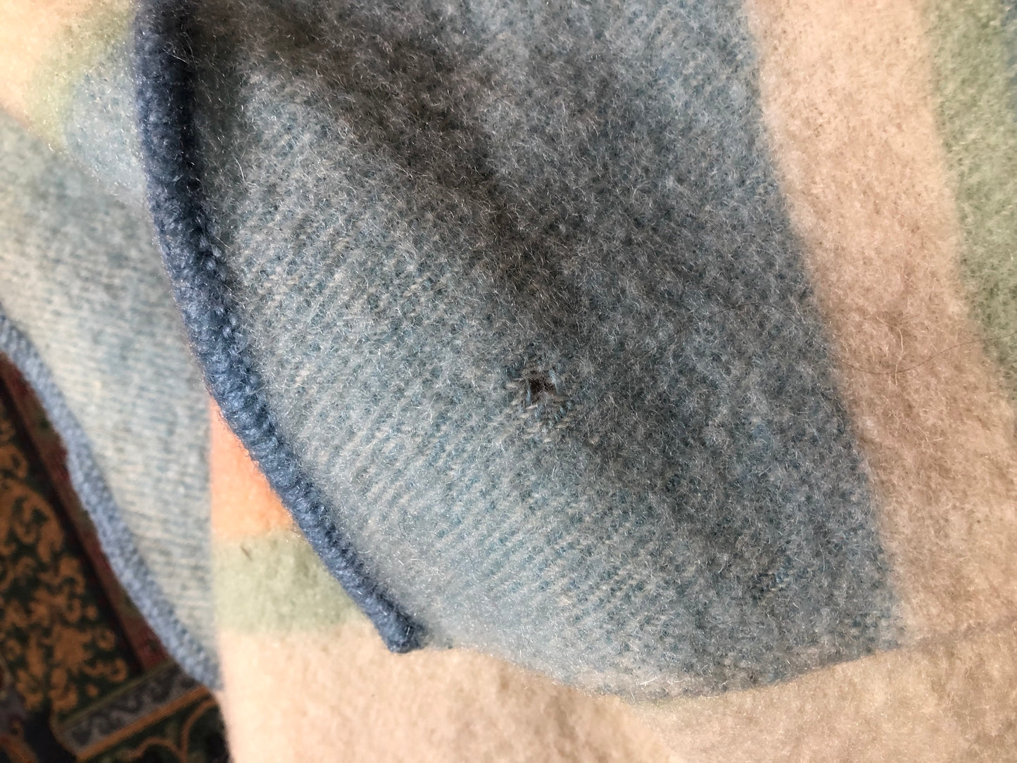 Kingspier Vintage - White 100% wool small blanket or throw with pastel stripes on both ends.