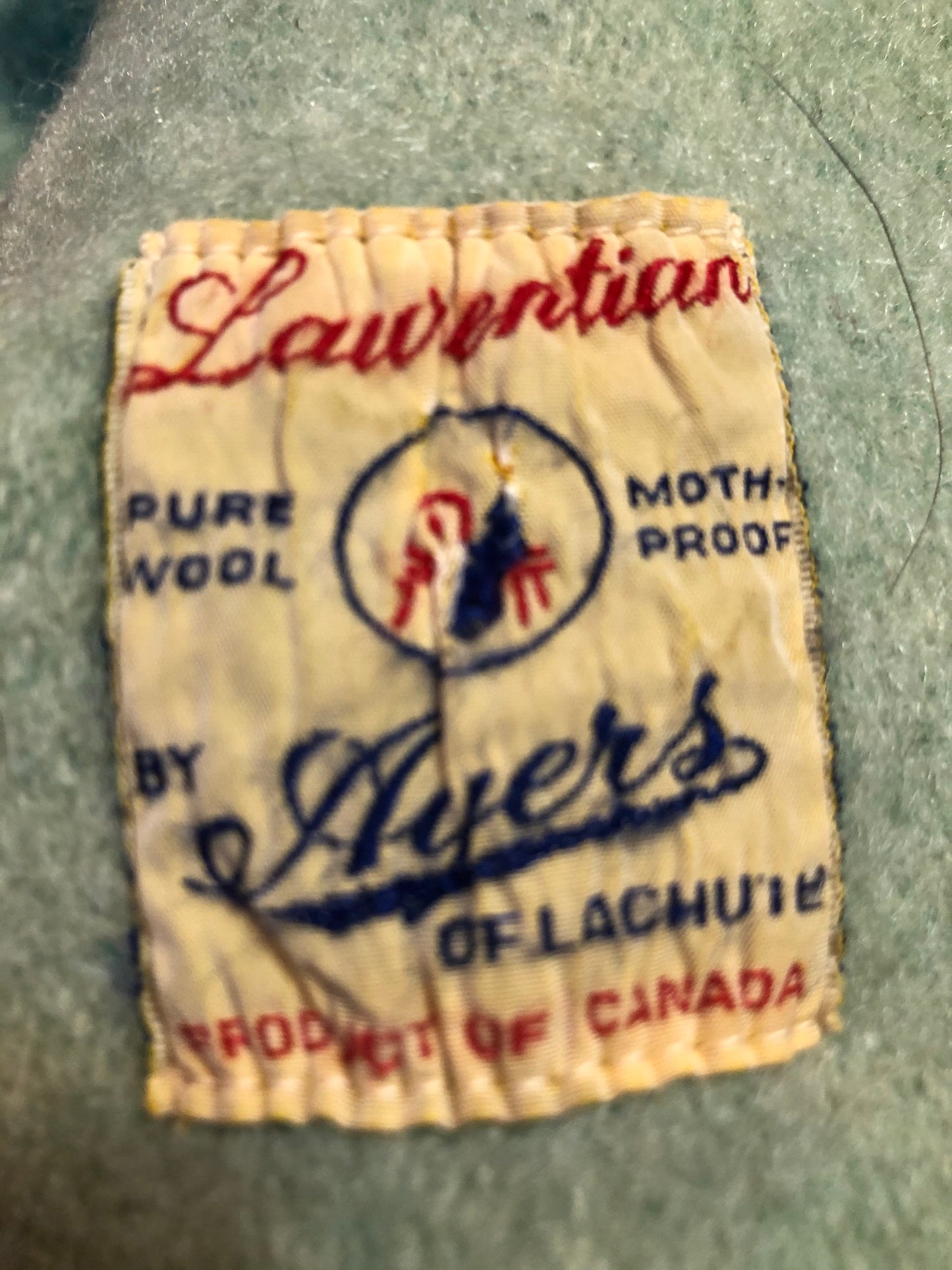 Kingspier Vintage - Vintage 60’s Ayer’s of Lachute 100% wool blanket in cream with green stripes at both ends. Mother proof and made in Canada.