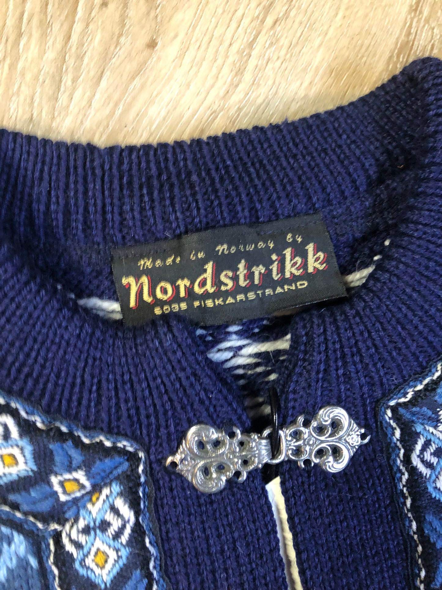 Vintage Nordstrikk 100% wool quarter cut jumper with colourful blue and yellow Norwegian pattern and pewter clasps. Made in Norway - Kingspier Vintage