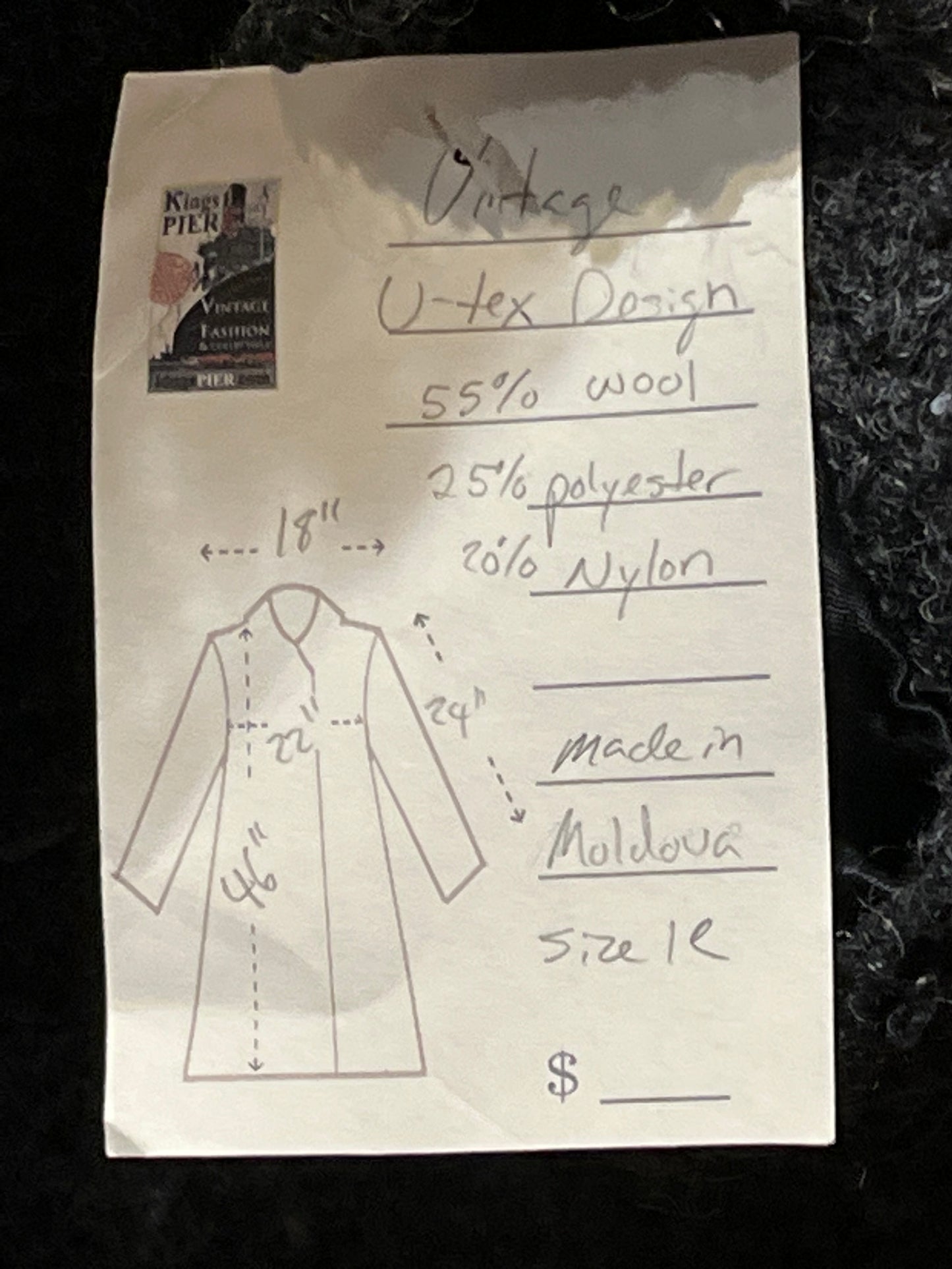 Vintage U-Tex Design long grey wool blend (55% wool/ 25% polyester/ 20% nylon) coat with button closures, two front patch pockets and removable mongolian wool style collar.
Made in Moldova