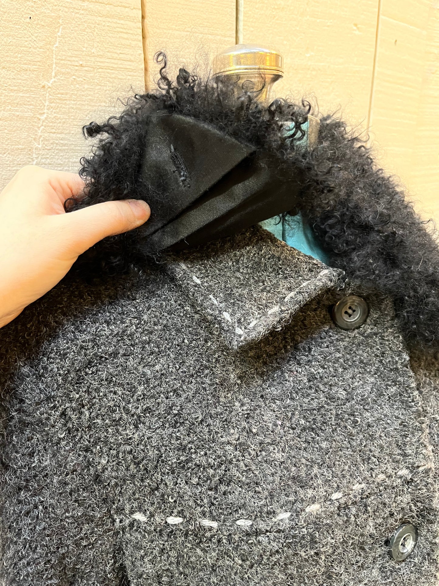 Vintage U-Tex Design long grey wool blend (55% wool/ 25% polyester/ 20% nylon) coat with button closures, two front patch pockets and removable mongolian wool style collar.
Made in Moldova