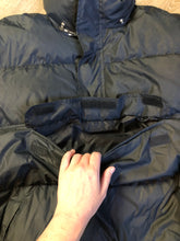 Load image into Gallery viewer, Vintage 1980s Woods down filled anorak jacket in black with nylon shell, front pouch pocket, handwarmer zip pockets, drawstring at the waist and adjustable velcro wrists. Made in Canada. Size XL.

