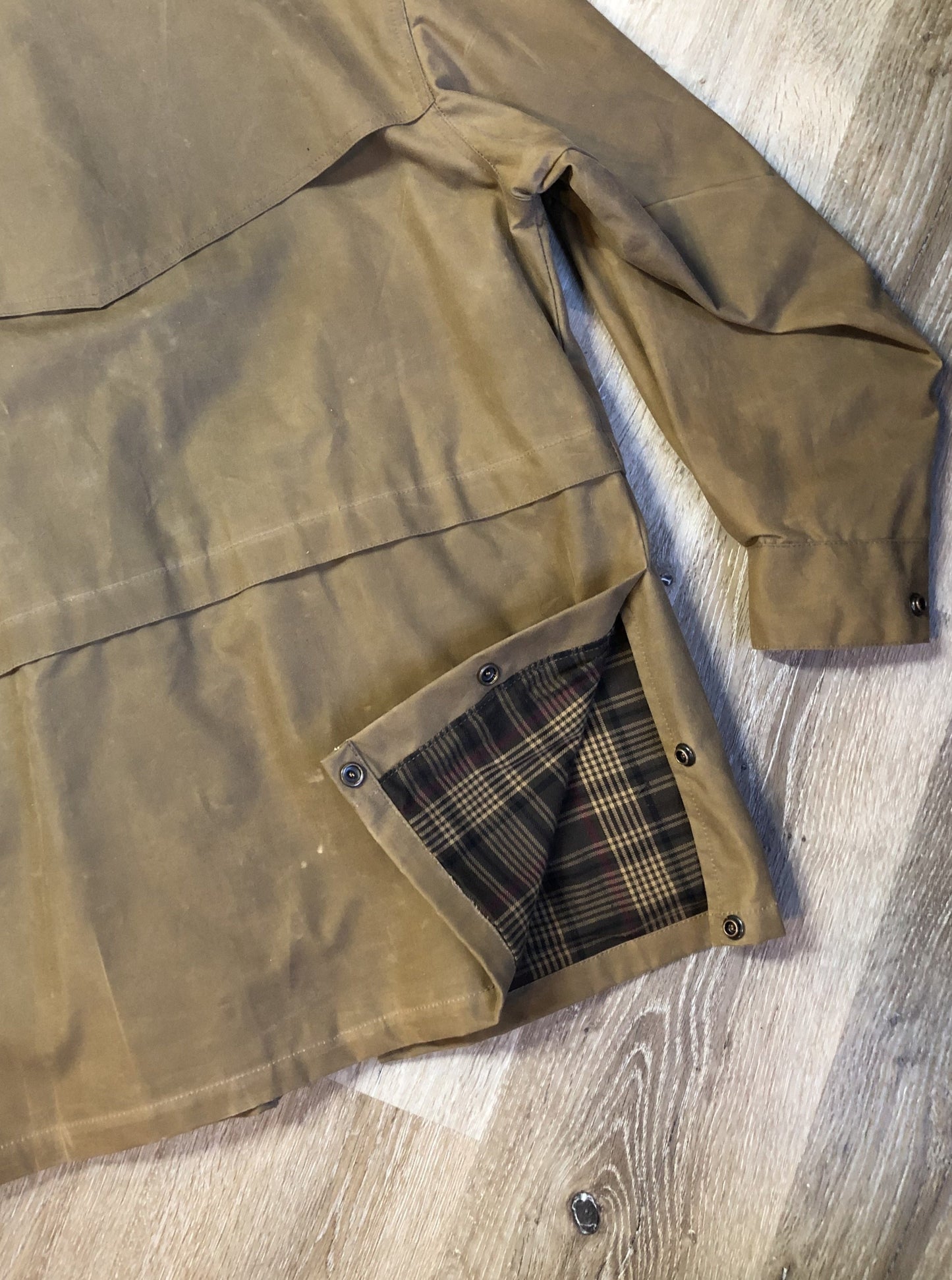 Vintage Australian Outback Collection Oilskin chore jacket with snap and zipper closure, flap pockets, wax cotton shell, plaid lining and leather trim. NWOT. Made in Canada - Kingspier Vintage