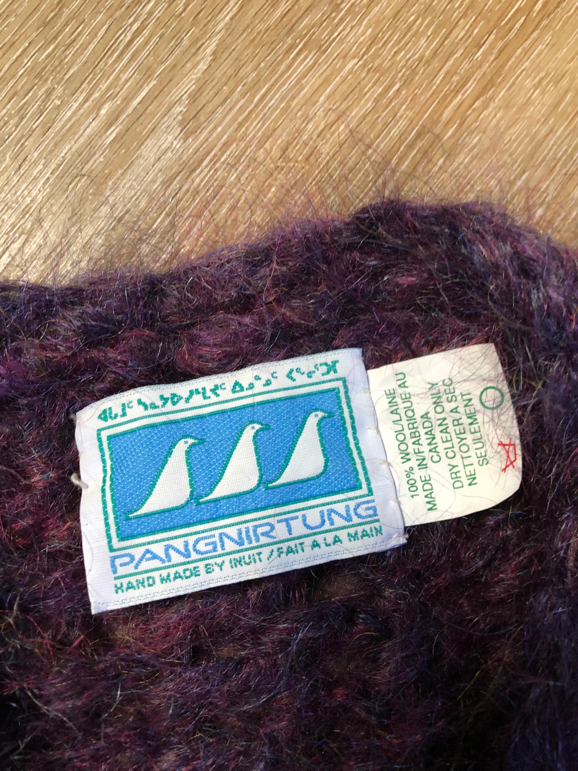 Vintage Pangnirtung Inuit handmade 100% wool cardigan in vibrant purples with felt applique designs and colourful embroidered trim. Made in Canada. - Kingspier Vintage