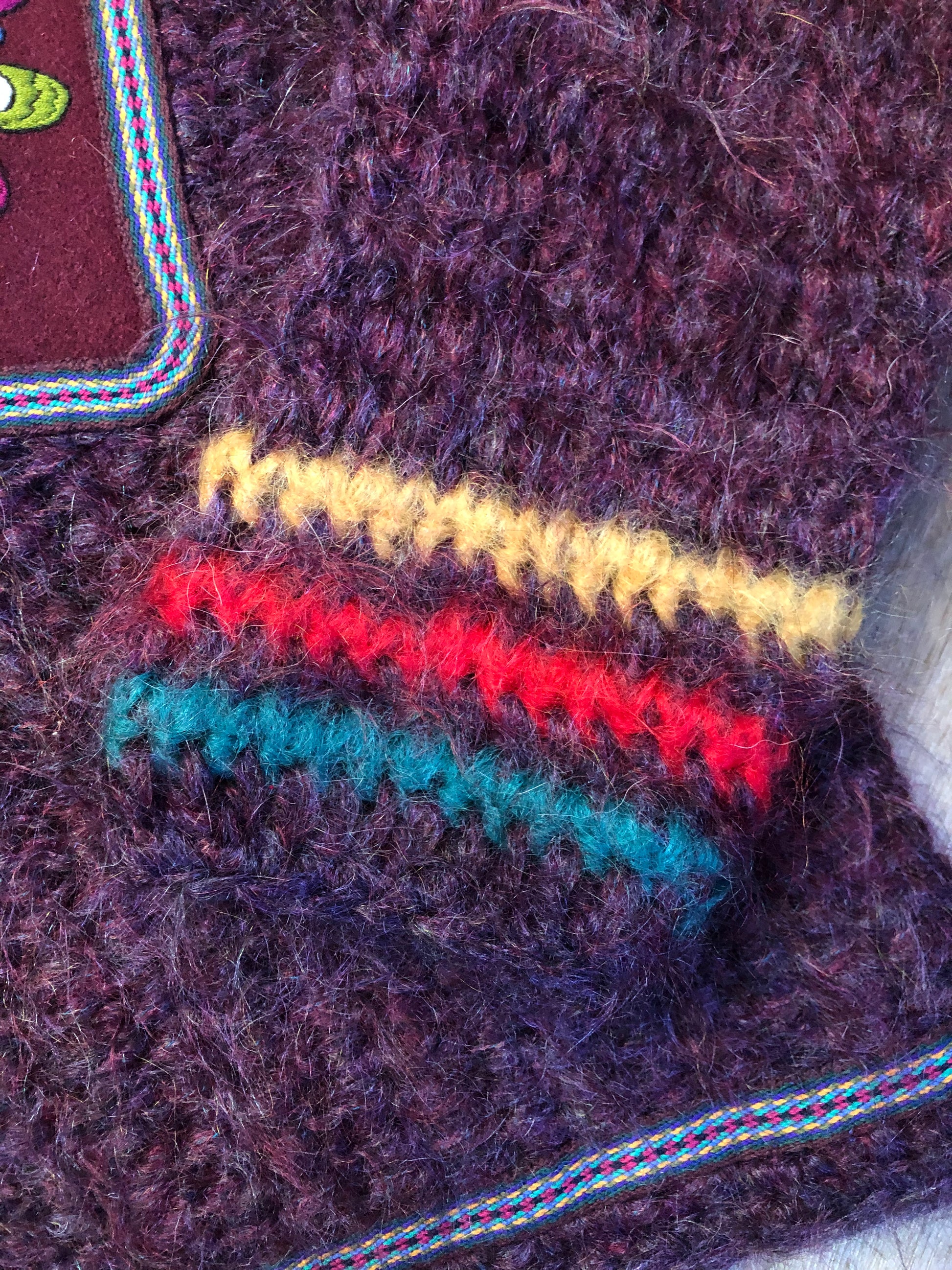 Vintage Pangnirtung Inuit handmade 100% wool cardigan in vibrant purples with felt applique designs and colourful embroidered trim. Made in Canada. - Kingspier Vintage