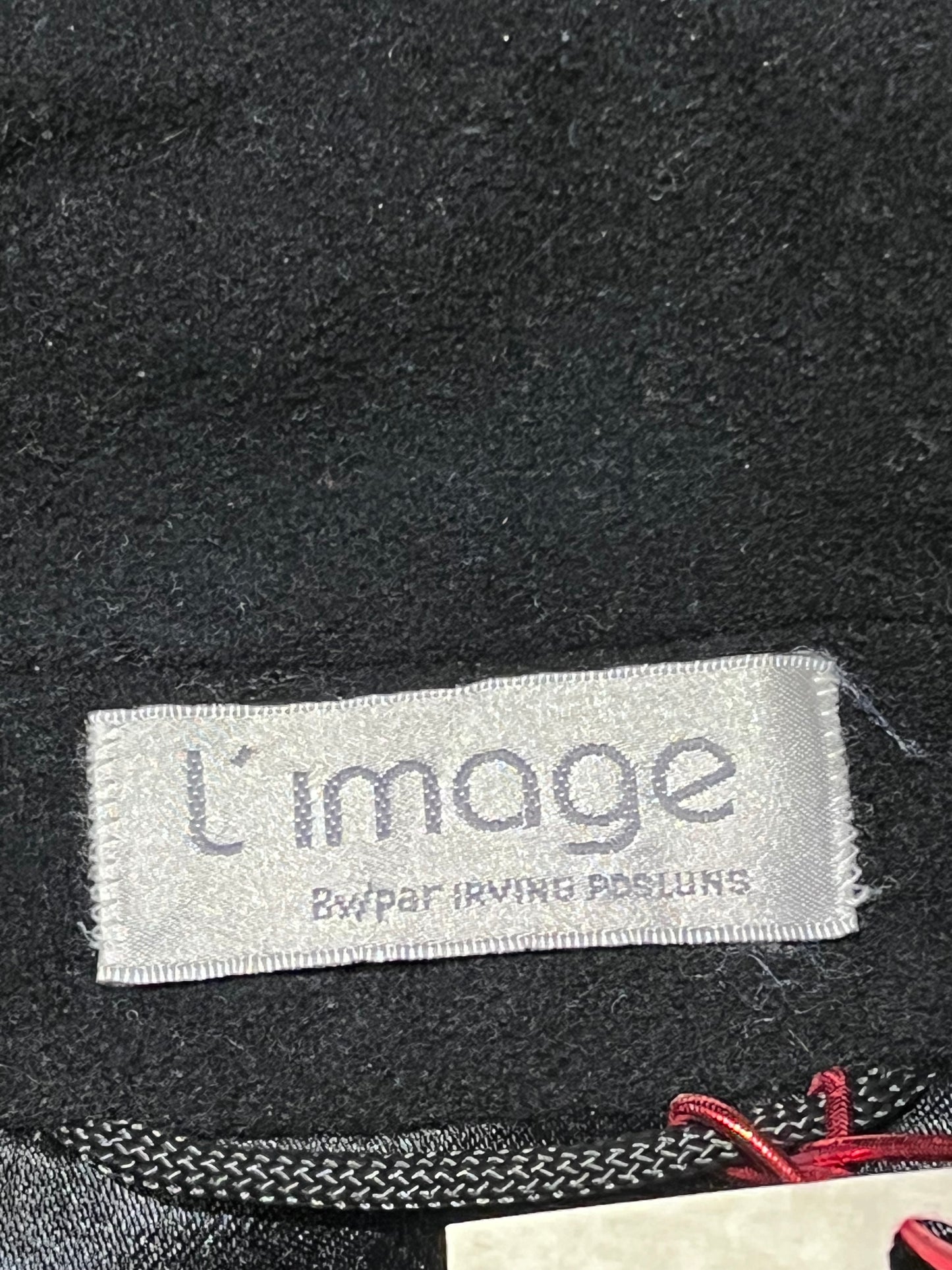 Vintage L’image by Irving Posluns wool blend (60% wool/ 25% cashmere/ 15% nylon) long black coat with unique button closures and two front pockets.
Union Made in Canada
Chest 42”