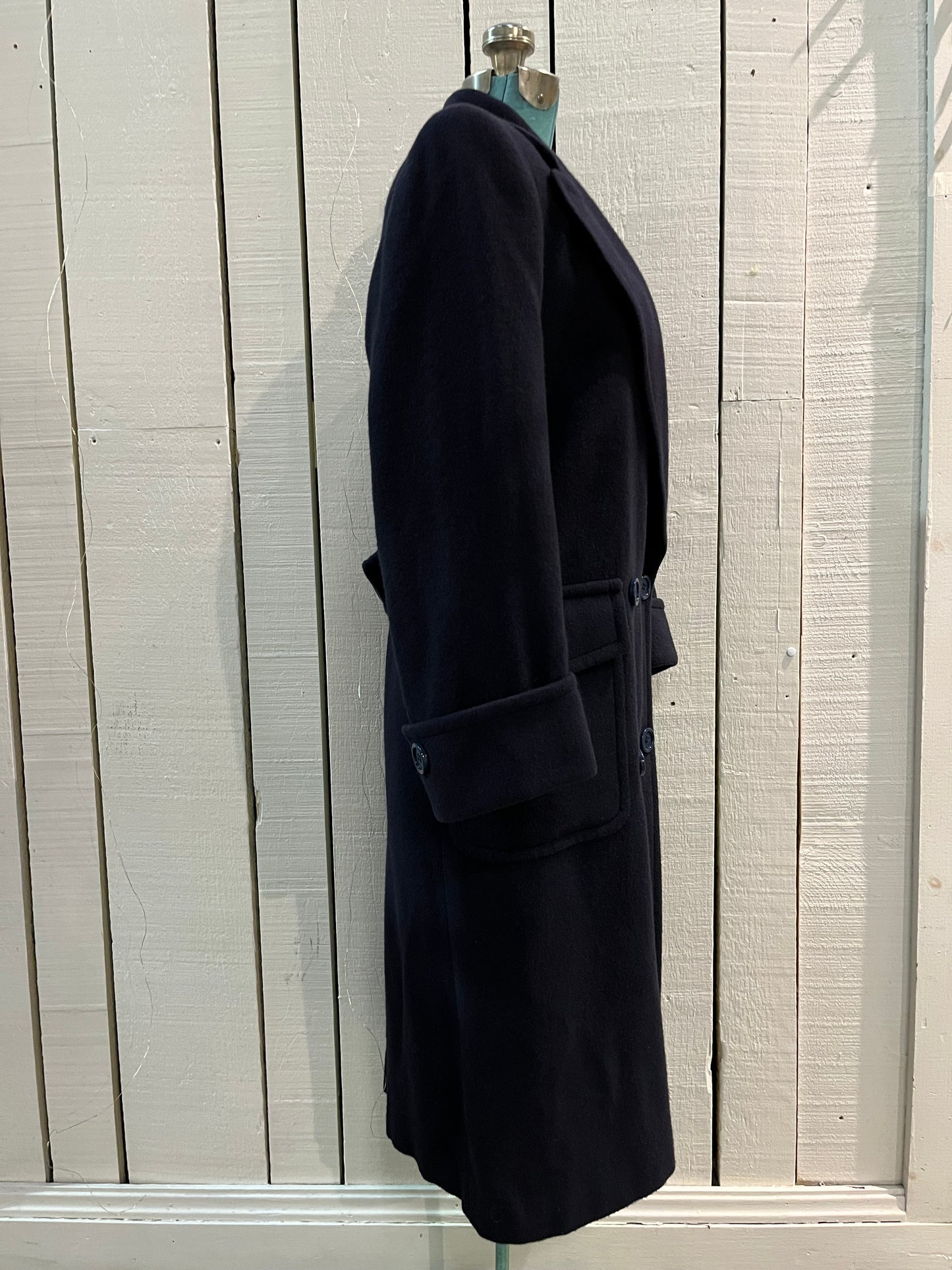 Vintage Fleurette of California from Nordstrom navy double breasted 100% camel hair coat with flap pockets.
Union Made in USA
Chest 41”