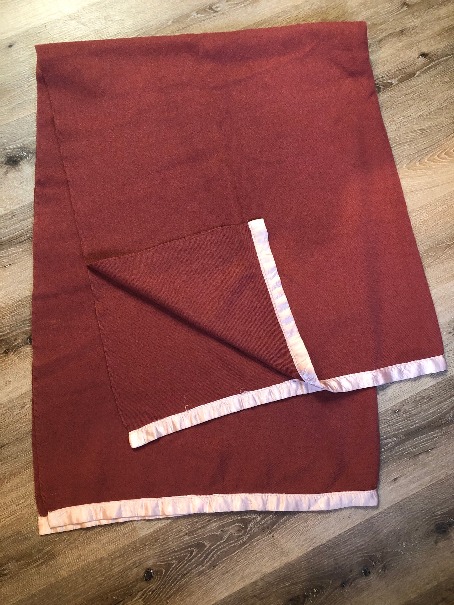 Kingspier Vintage - Berry 100% wool lap blanket with light pink ribbon trim. .