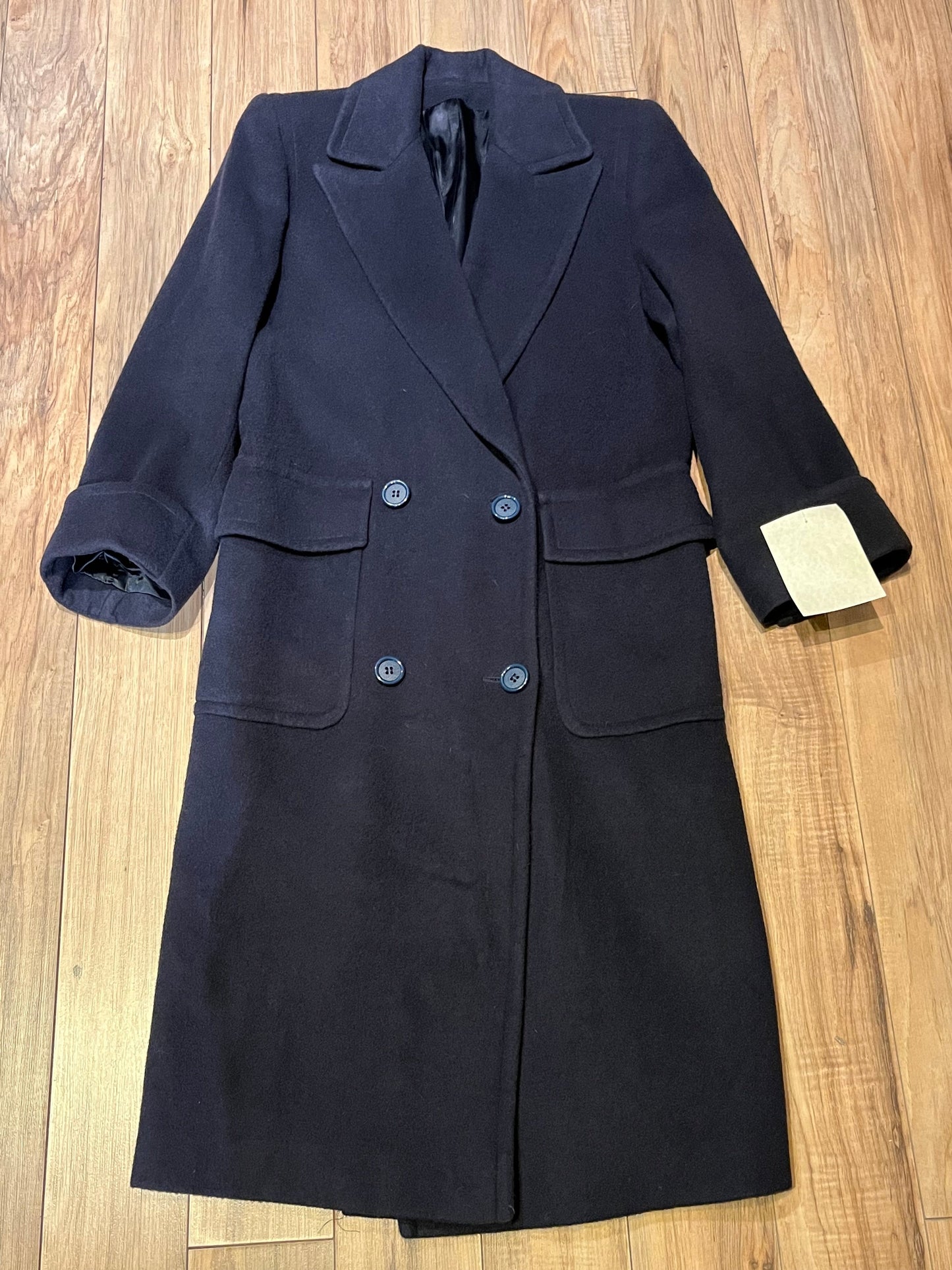 Vintage Fleurette of California from Nordstrom navy double breasted 100% camel hair coat with flap pockets.
Union Made in USA
Chest 41”