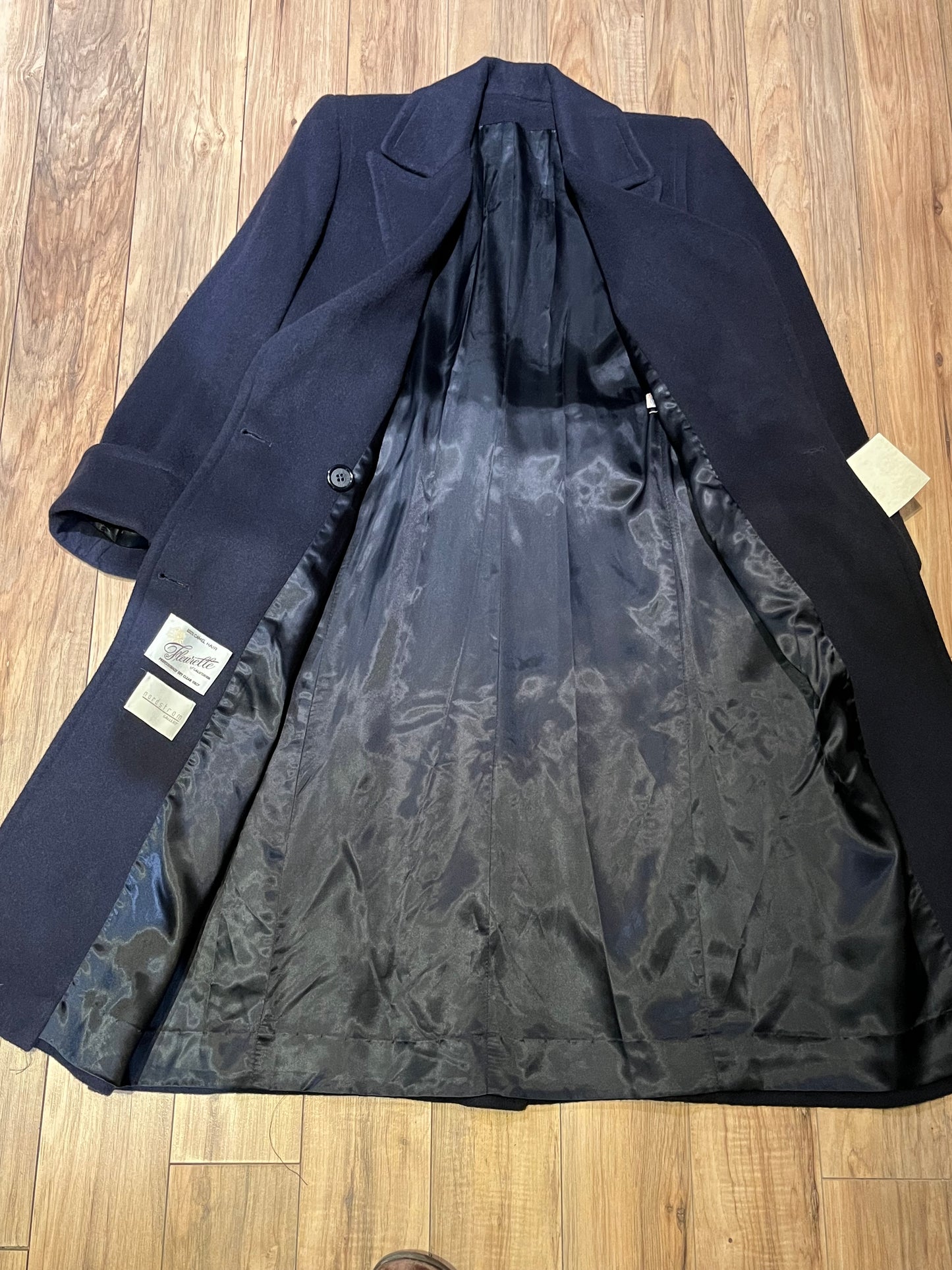 Vintage Fleurette of California from Nordstrom navy double breasted 100% camel hair coat with flap pockets.
Union Made in USA
Chest 41”