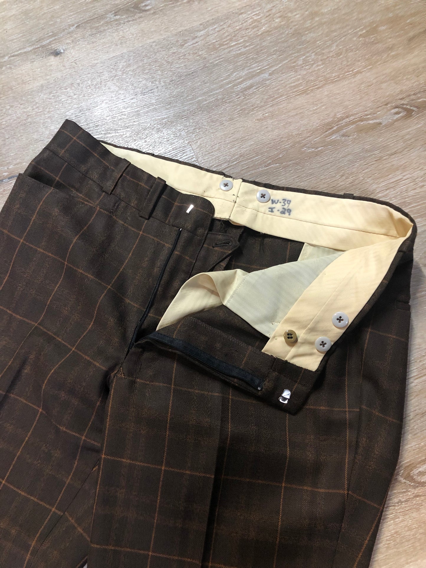 Vintage Warren Kloors 100% wool suit in brown and orange plaid. Lining has been extended in both jacket and pants. Made in Canada - Kingspier Vintage