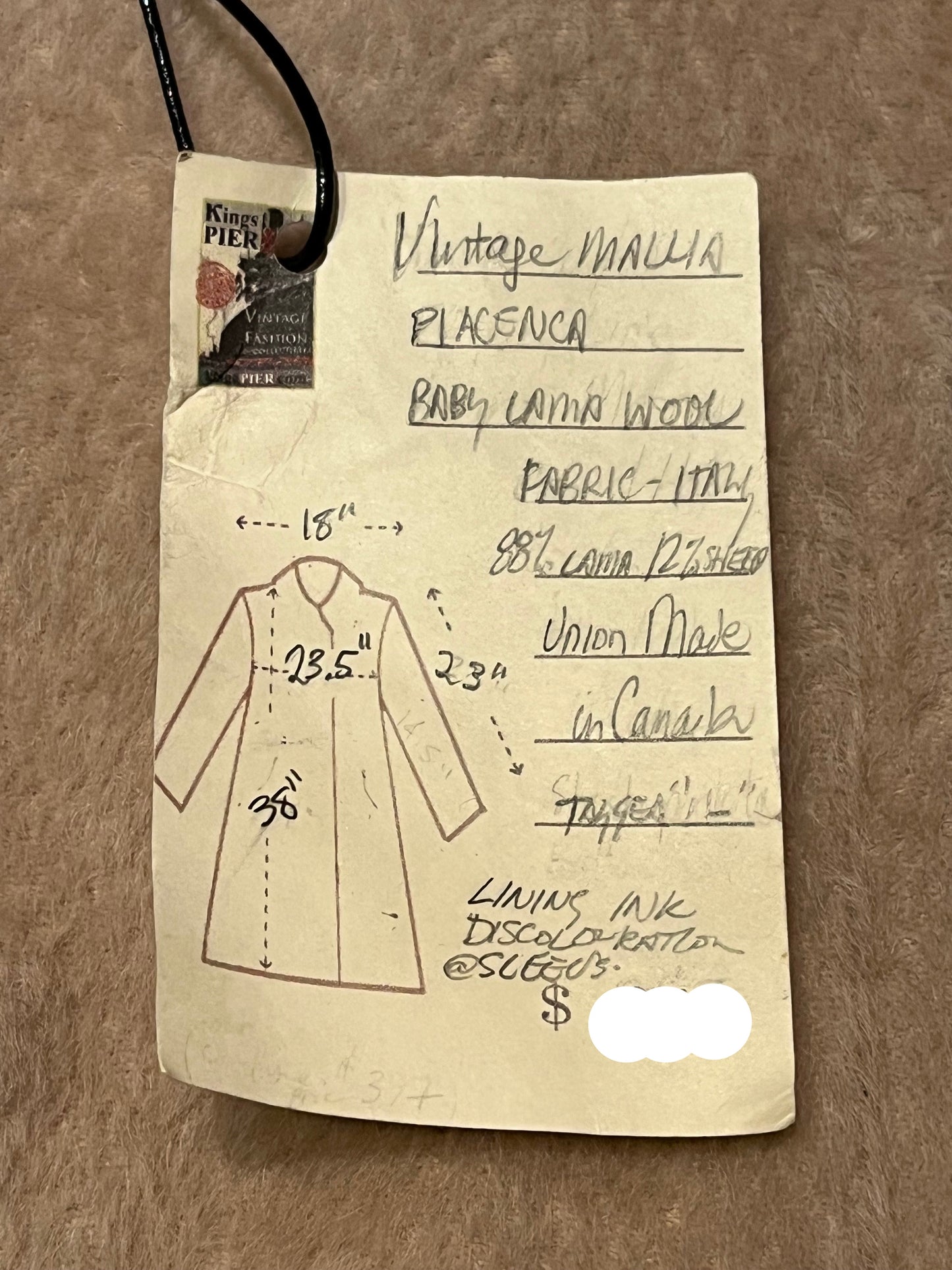 Vintage Mallia long baby lama blend (88% baby lama/ 12% wool) coat with button closures and two front pockets.
Union Made in Canada
Size 16