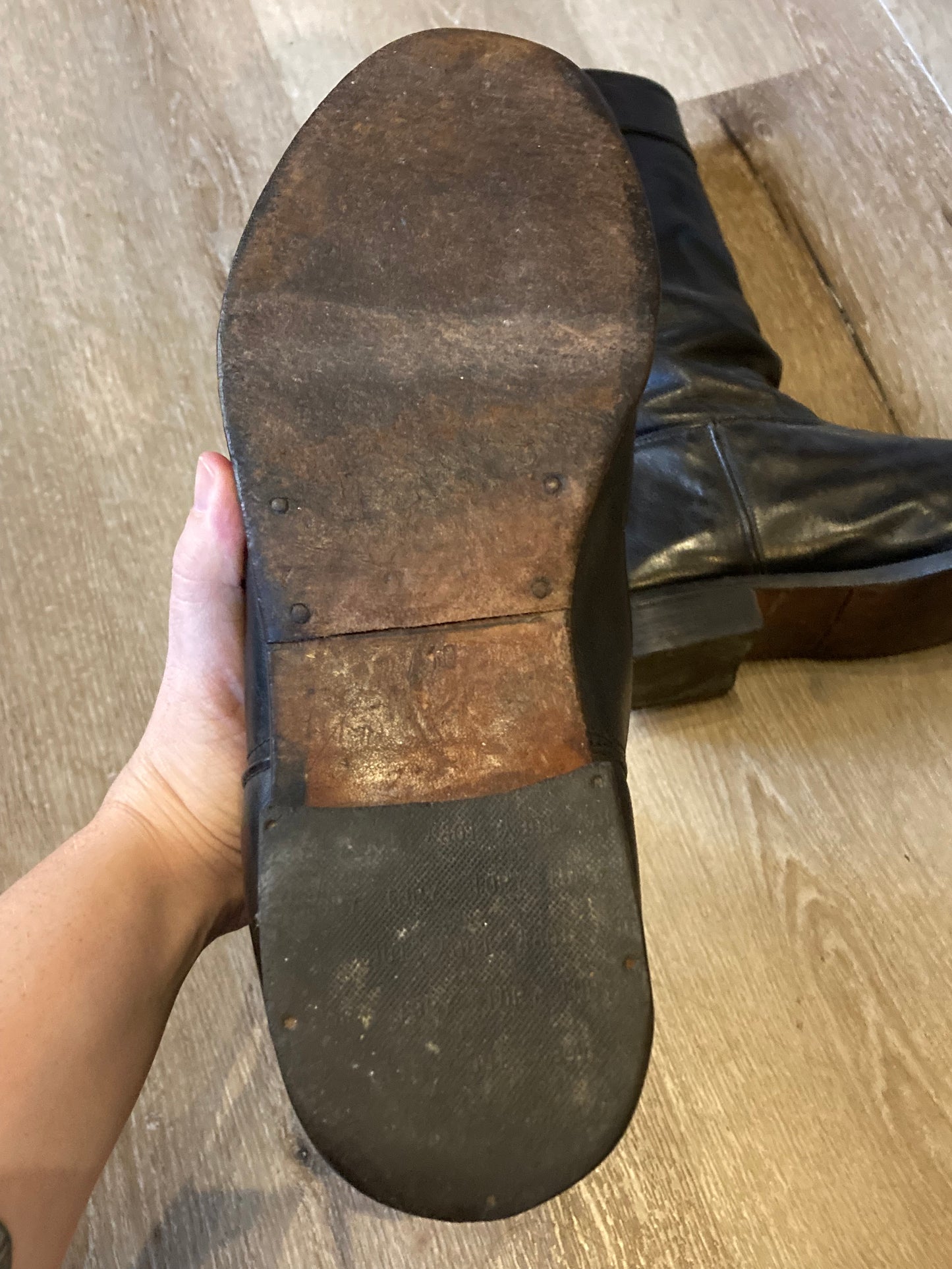 Vintage calf height black leather boots circa 1960. Leather lined with leather soles. Size 10M, 12W US, 43 EUR