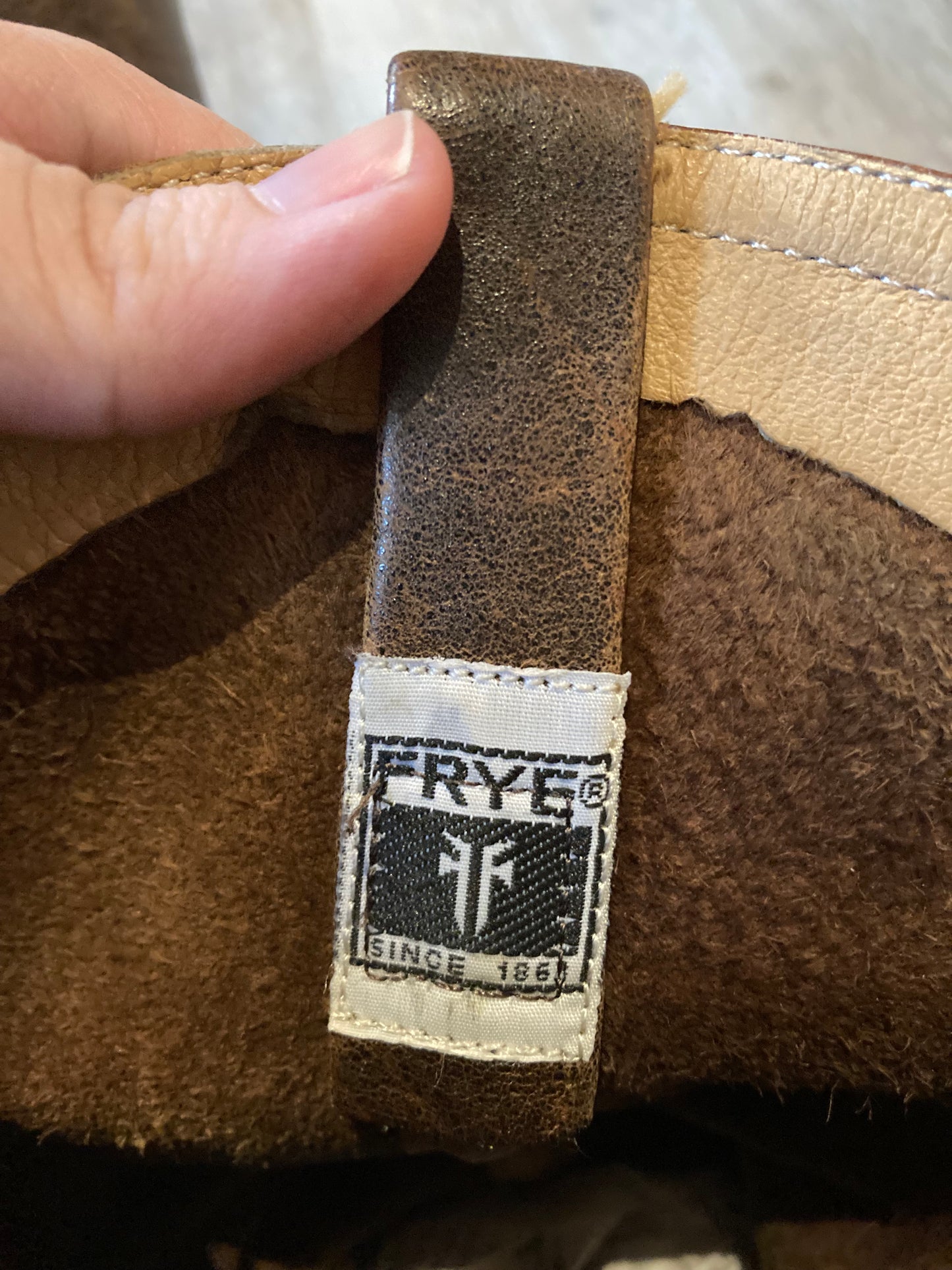 Vintage Frye dark brown full grain leather western boots with brass O ring detail. Made in Mexico. Size 6W US, EUR 36