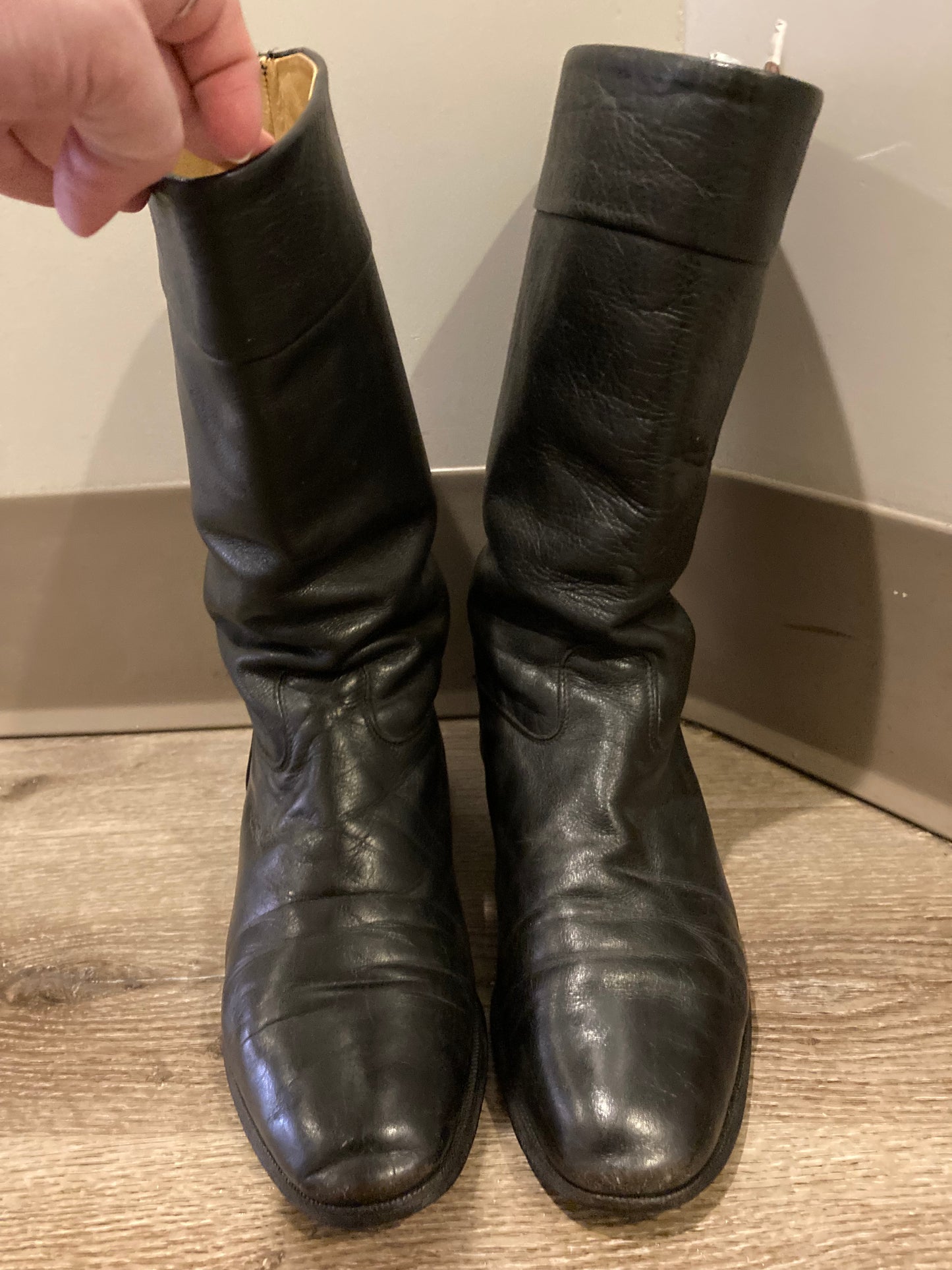 Vintage calf height black leather boots circa 1960. Leather lined with leather soles. Size 10M, 12W US, 43 EUR
