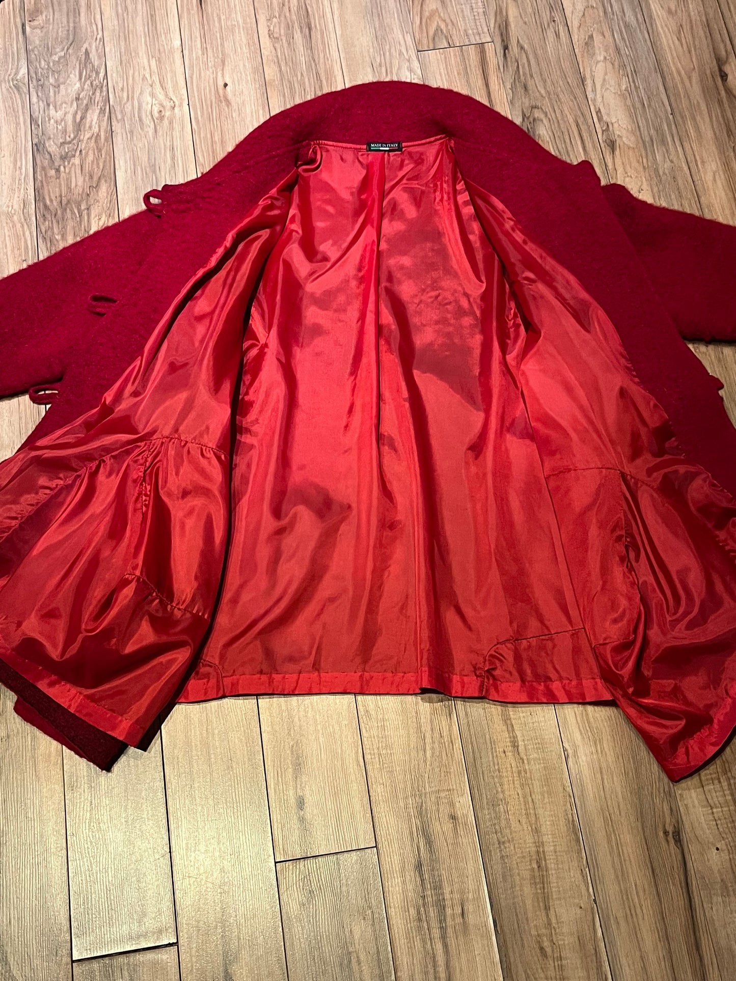 Red and blue wool blend (80% wool/ 20%) patch work coat with matching scarf, toggle closures and two front pockets.
Made in Italy
Chest 43”