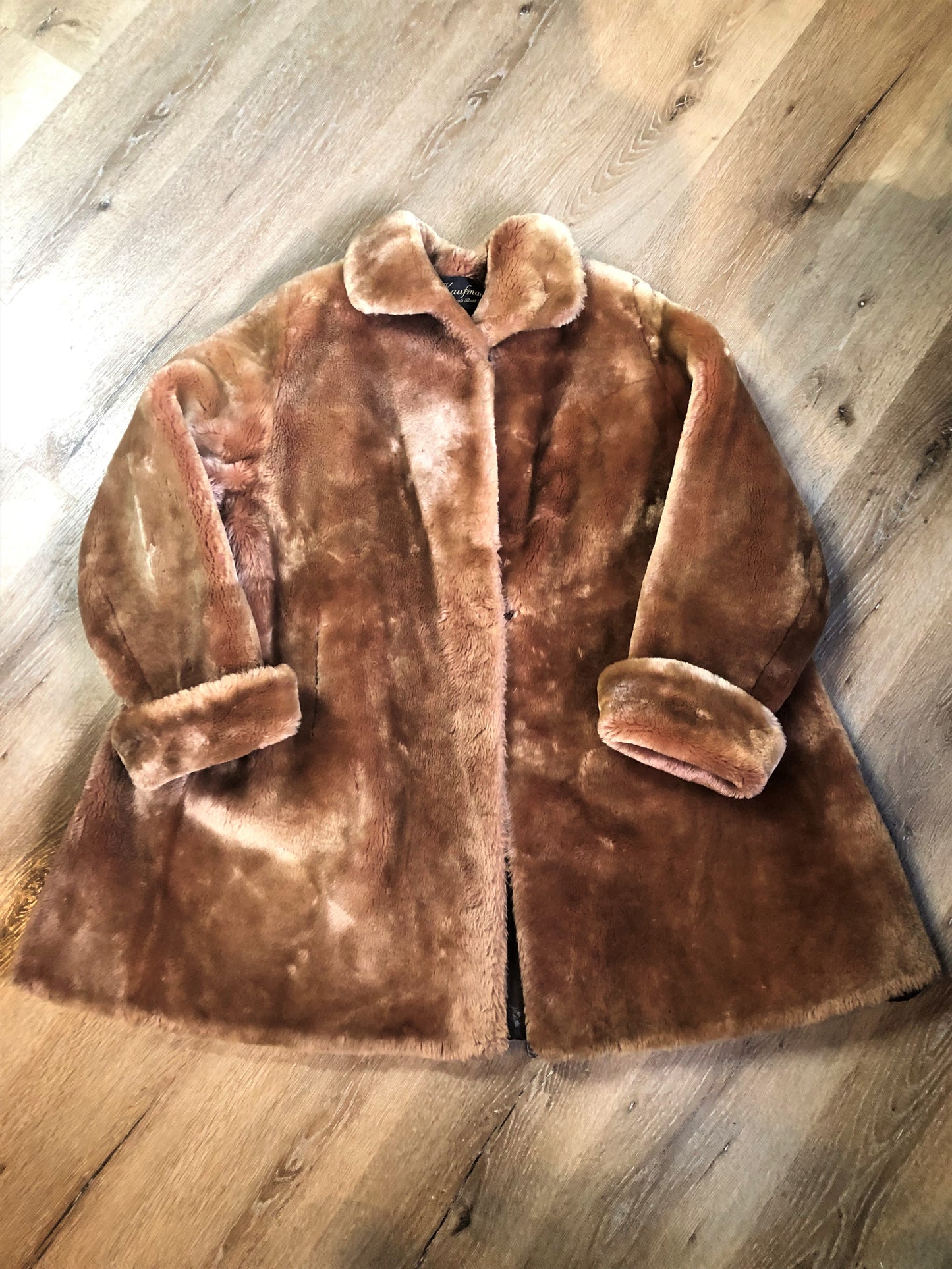 Vintage mid century blonde fur coat with unique blush undertones. Hook and eye closures with front pockets and satin lining with floral motif. Fur type unknown but it feels like shorn beaver fur - Kingspier Vintage