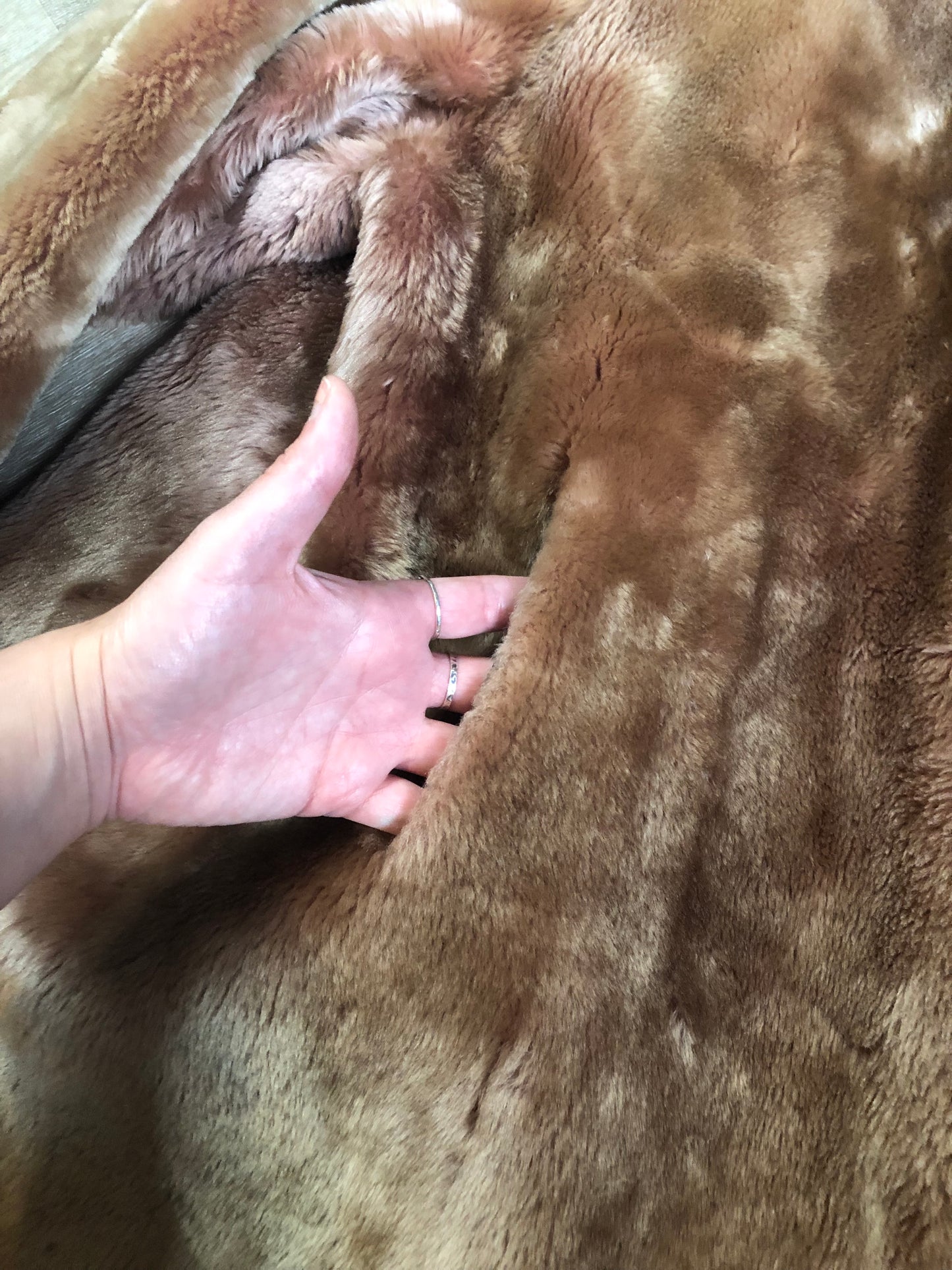 Vintage mid century blonde fur coat with unique blush undertones. Hook and eye closures with front pockets and satin lining with floral motif. Fur type unknown but it feels like shorn beaver fur - Kingspier Vintage