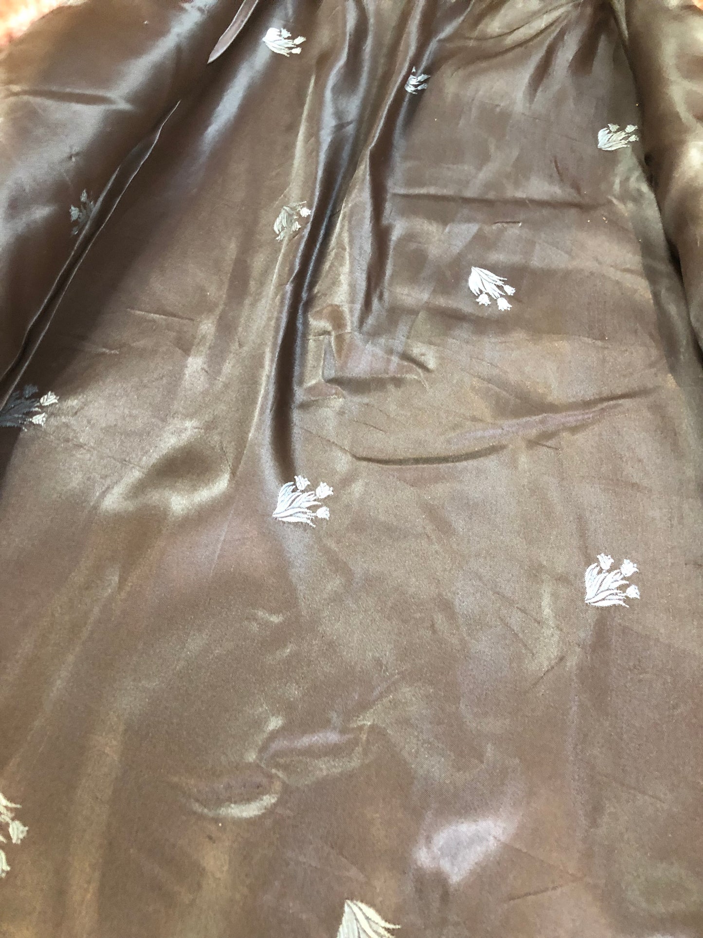 Vintage mid century blonde fur coat with unique blush undertones. Hook and eye closures with front pockets and satin lining with floral motif. Fur type unknown but it feels like shorn beaver fur - Kingspier Vintage