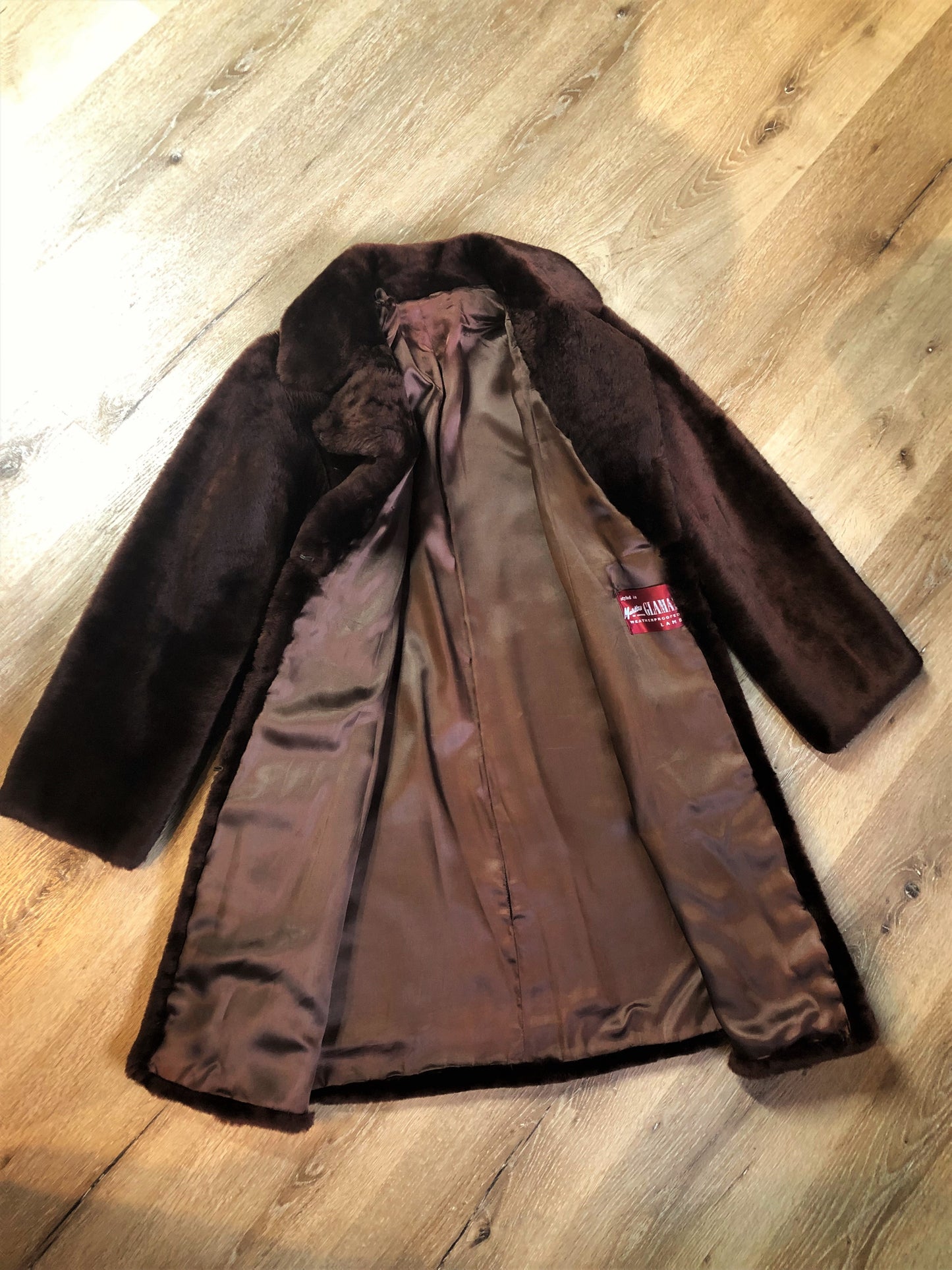 Vintage Martins of London “Glamar” weatherproofed lambs fur in dark brown with satin lining, hook and eye clasps and pockets - Kingspier Vintage