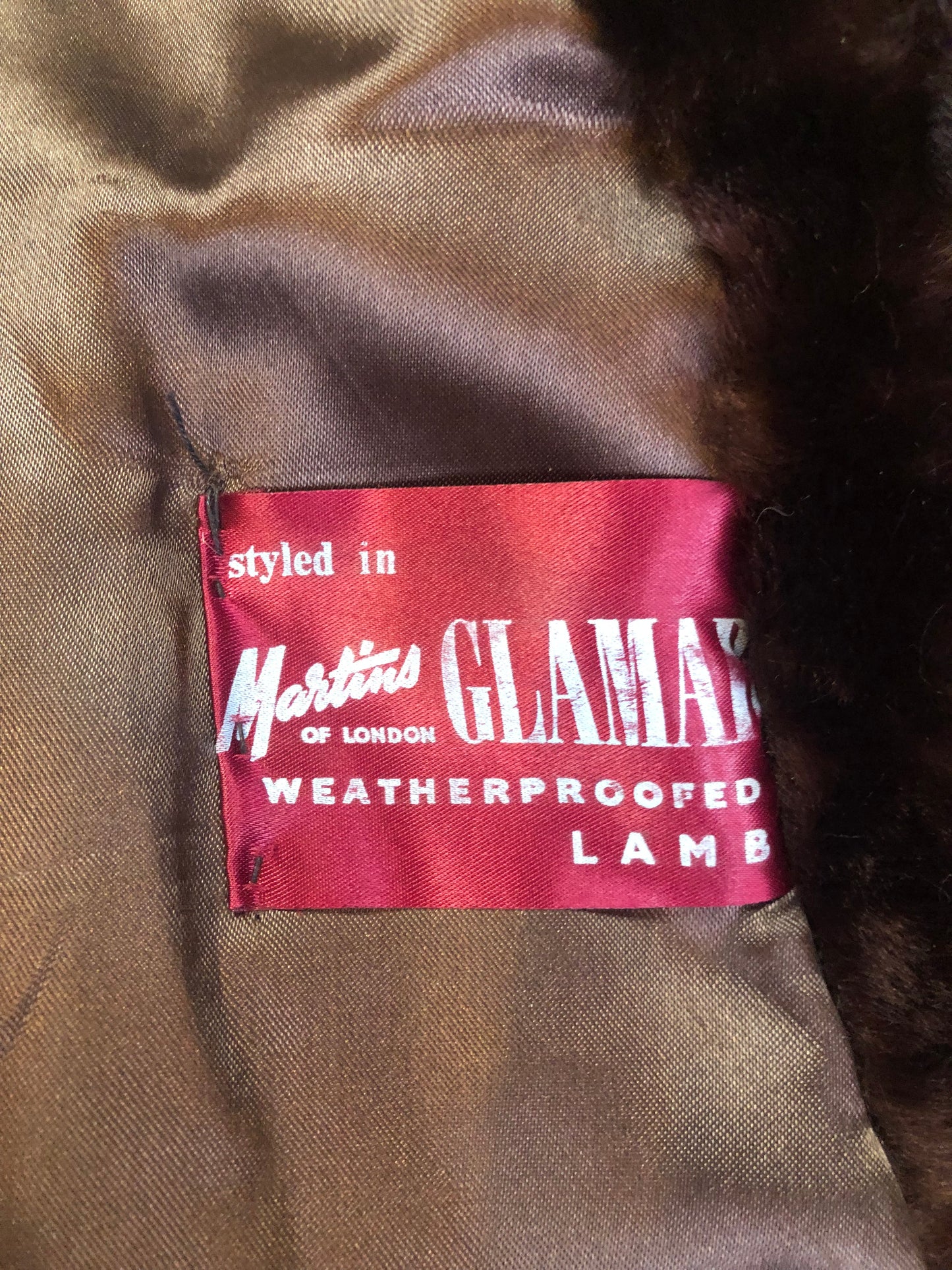 Vintage Martins of London “Glamar” weatherproofed lambs fur in dark brown with satin lining, hook and eye clasps and pockets - Kingspier Vintage