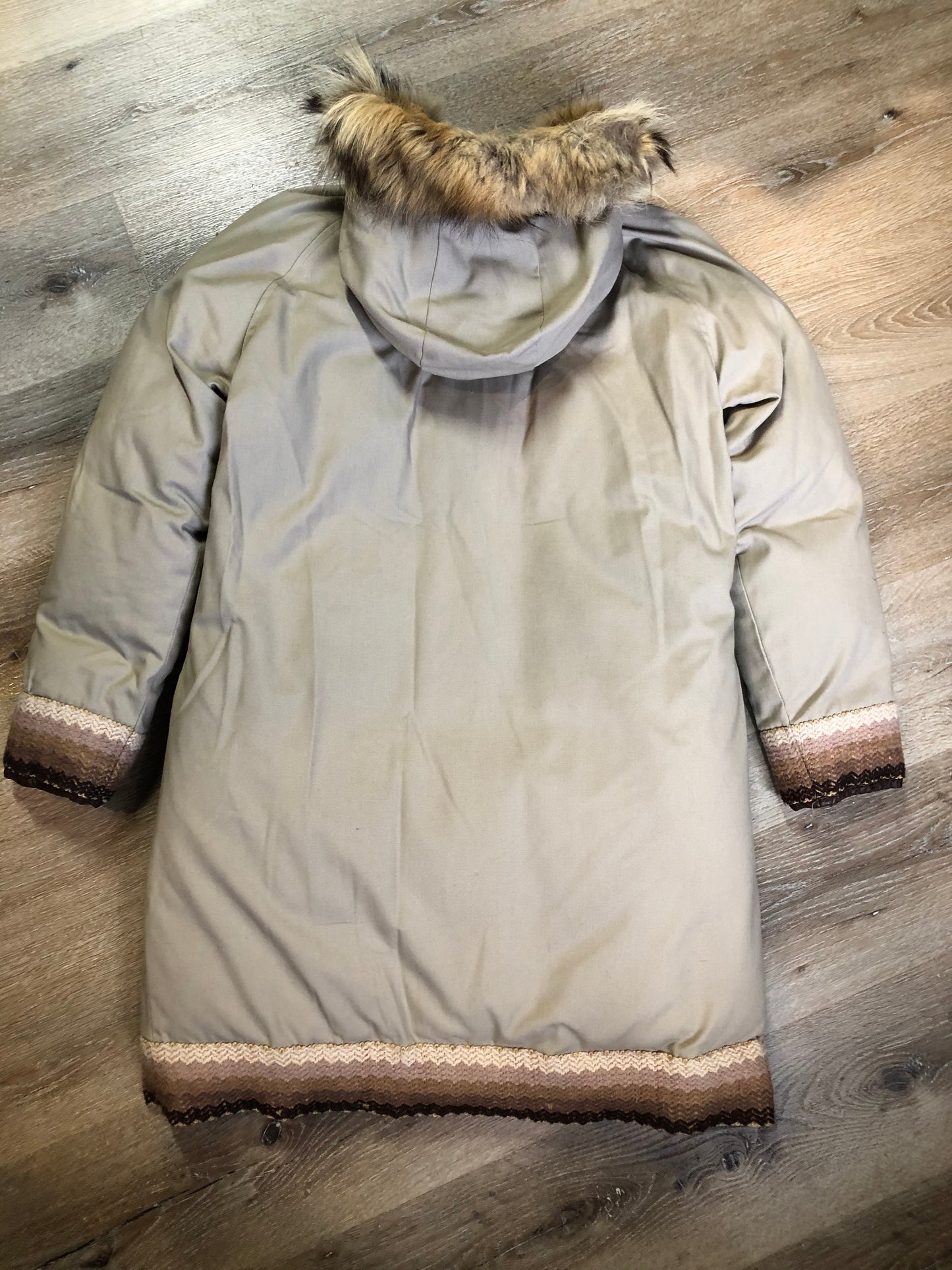 Kingspier Vintage - Vintage Rice Sportswear beige down-filled parka, with a fox fur trimmed hood. This exceptionally warm parka has embroidered ribbon detail in the cuffs and bottom hem. Parka features zipper and ribbon button closures, flap pockets and handwarmer pockets, Size medium. Made in Canada.