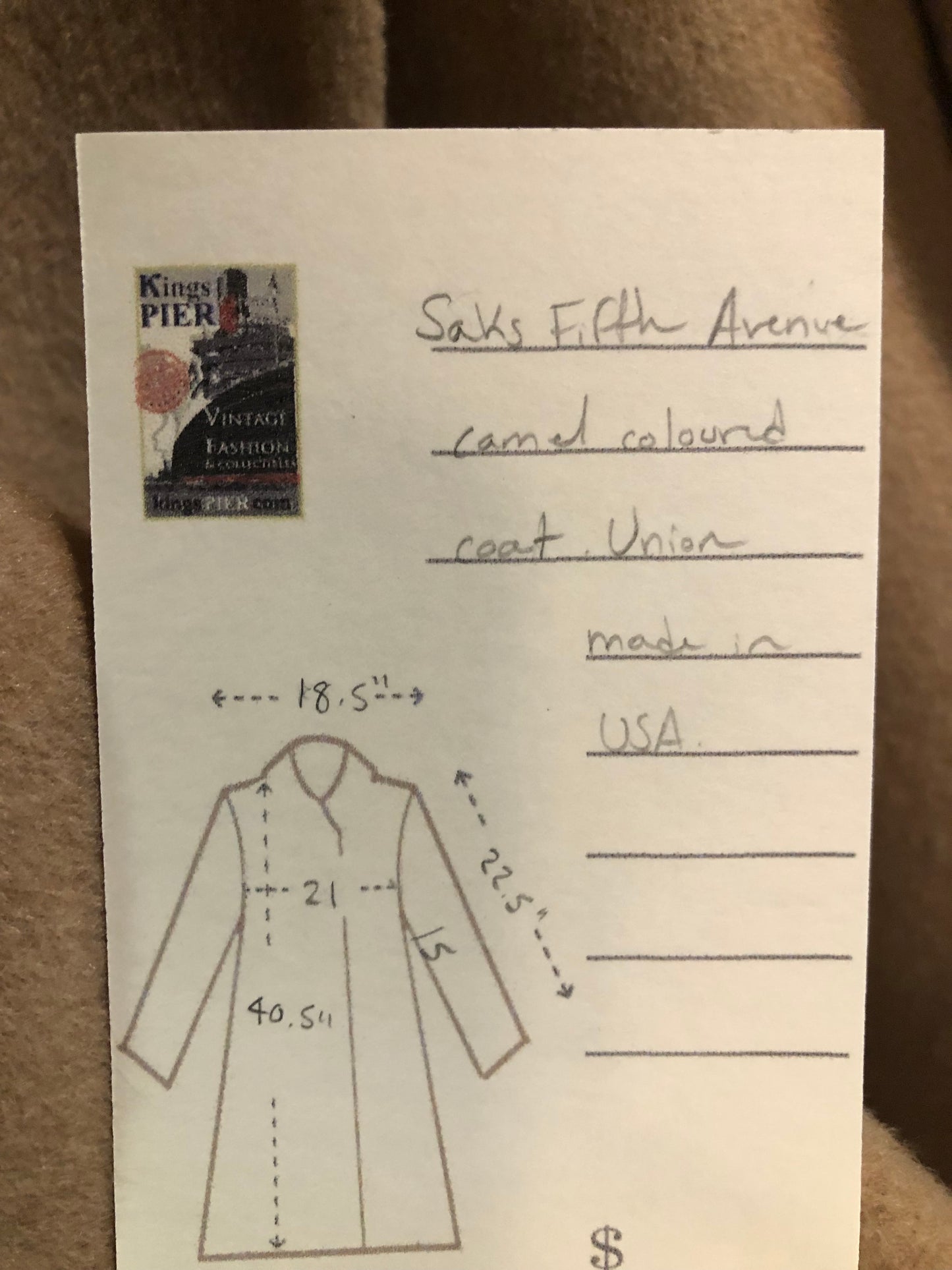 Vintage Saks Fifth Avenue full length double breasted coat in natural camel hair with flap pockets and satin lining. Union made in USA - Kingspier Vintage