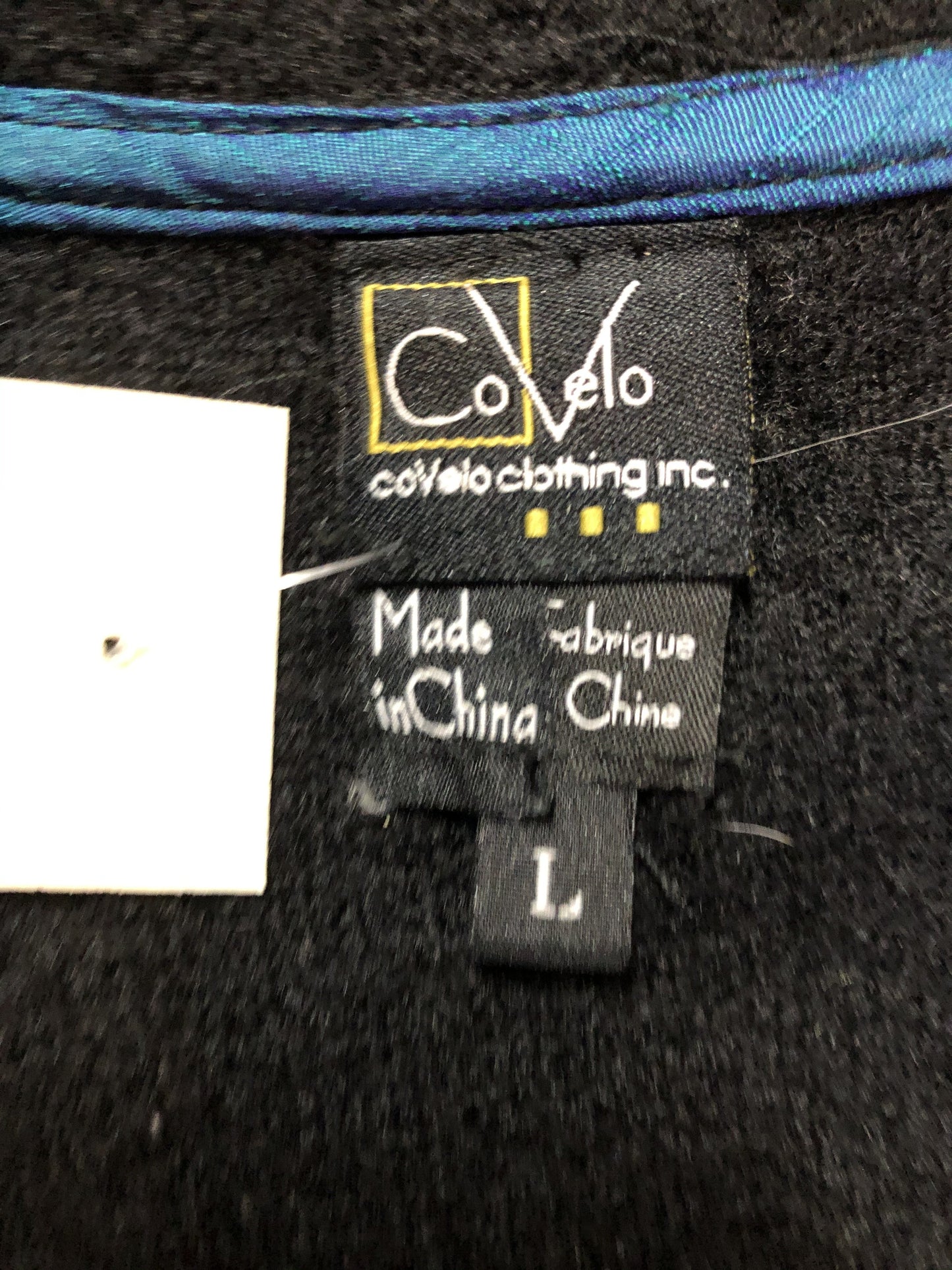 Kingspier Vintage - CoVelo Clothing black wool jacket with flower embellishments. Snap closures, side pockets and embroidered swirl decorative buttons. Size large.