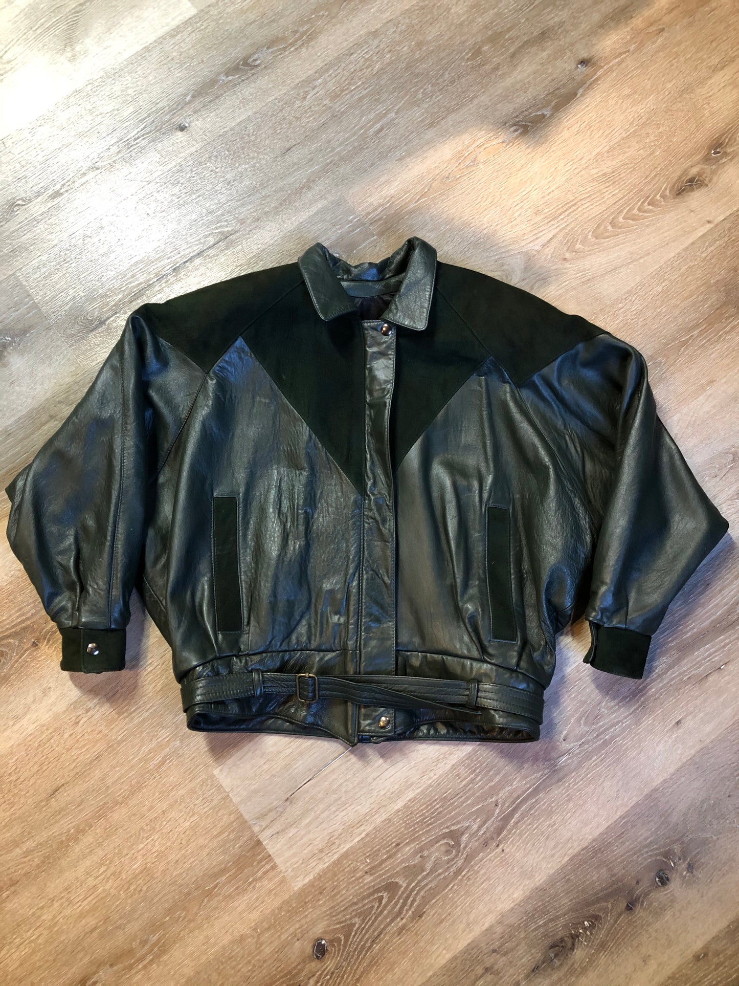 Kingspier Vintage - Bainton green leather jacket with green suede details, zipper and snap closures, slash pockets and black lining. Made in Canada. Size large.