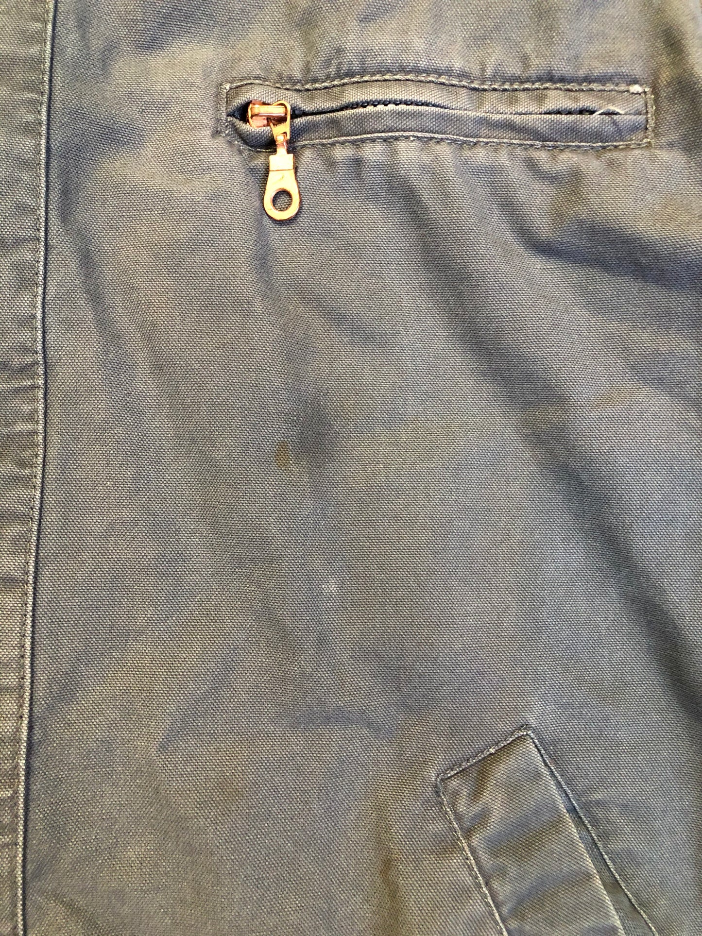 Kingspier Vintage - Dickie’s grey insulted chore jacket with grey corduroy collar, zipper closure, slash pockets, one zip pocket on the chest, one inside pocket and bright orange quilted lining. Size large.