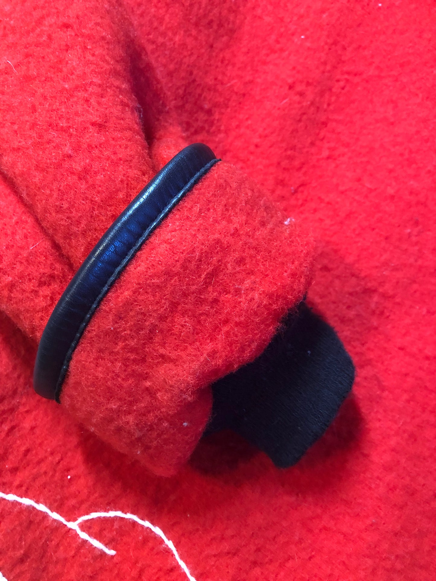 Vintage James Bay 100% virgin wool northern parka in bright red. This parka features a white fur trimmed hood, zipper closure, patch pockets, quilted lining, storm cuffs, embroidery details and northern fishing scene in felt applique. Made in Canada - Kingspier Vintage