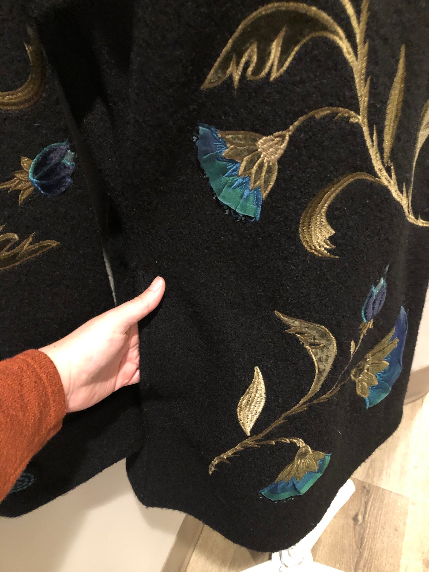 Kingspier Vintage - CoVelo Clothing black wool jacket with flower embellishments. Snap closures, side pockets and embroidered swirl decorative buttons. Size large.