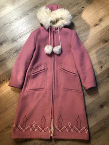 Vintage Hudson’s Bay Company pink 100% virgin wool parka with white fur trimmed hood, fur pom poms, zipper closure, patch pockets, satin lining and embroidered pattern along the hem. Made in Canada. Size 14 - Kingspier Vintage