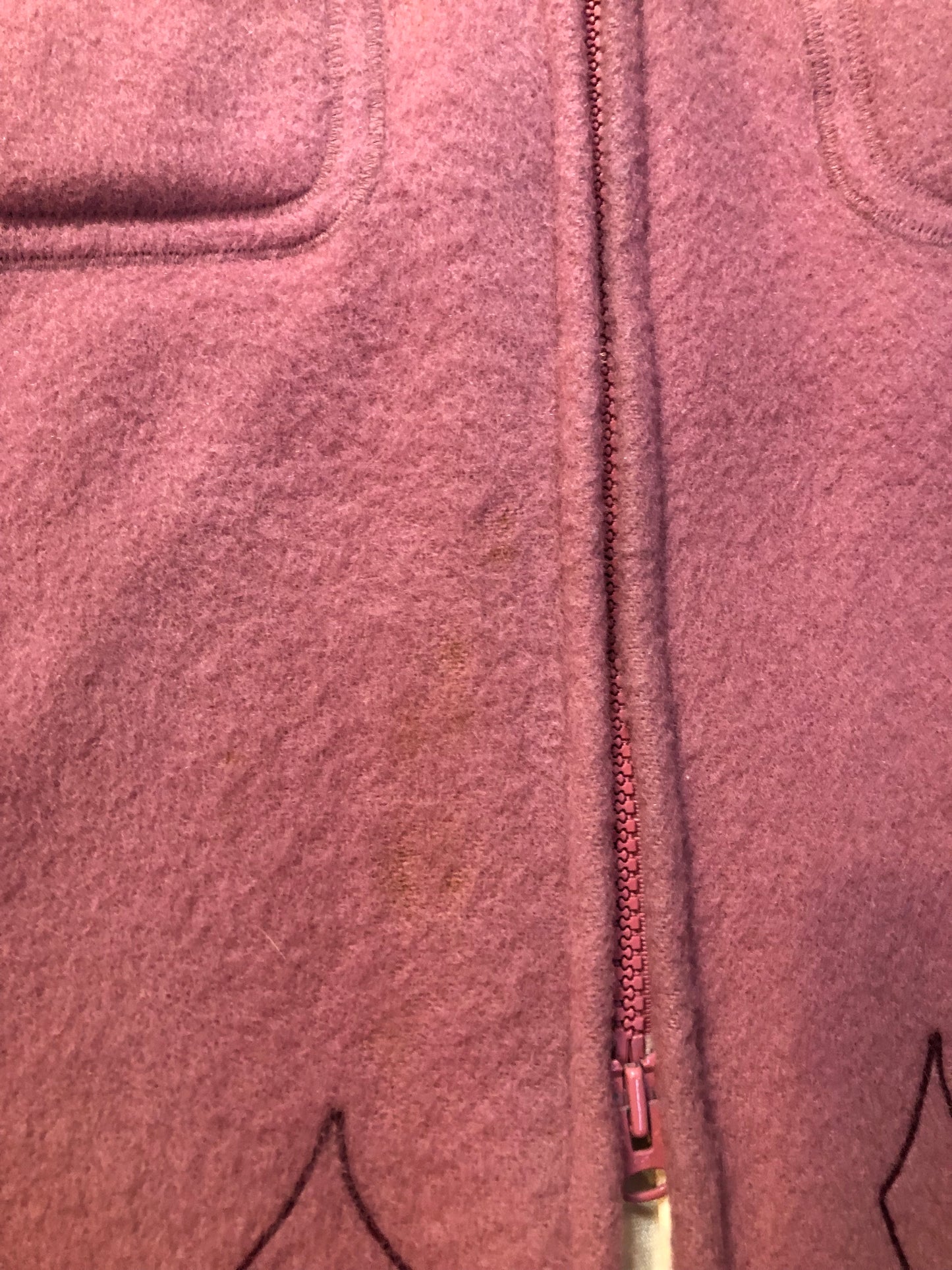 Vintage Hudson’s Bay Company pink 100% virgin wool parka with white fur trimmed hood, fur pom poms, zipper closure, patch pockets, satin lining and embroidered pattern along the hem. Made in Canada. Size 14 - Kingspier Vintage