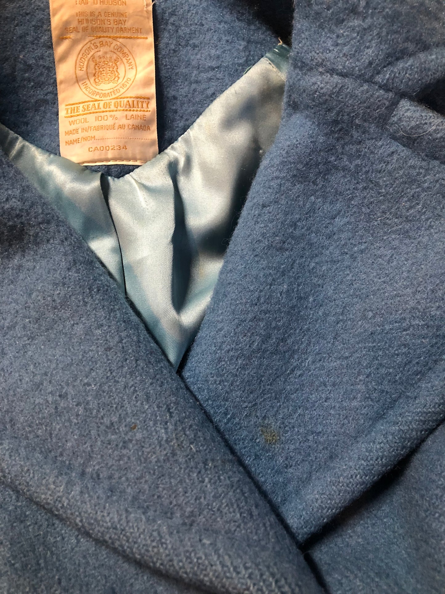 Hudson’s Bay Company Blue 100% virgin wool point blanket coat in a double breasted swing coat style with belt, detachable hood, button closures, slash pockets and satin lining. Made in Canada. Size small - Kingspier Vintage