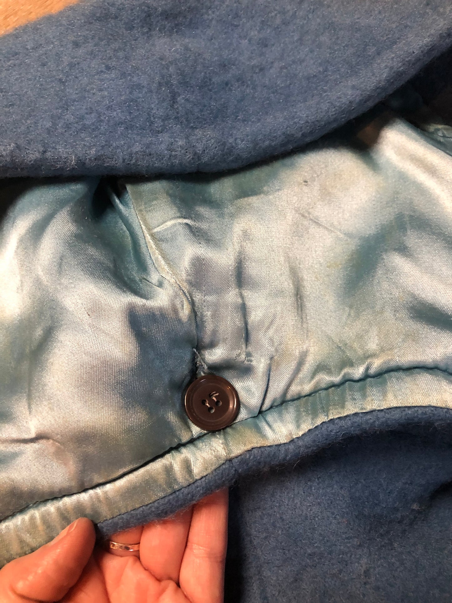 Hudson’s Bay Company Blue 100% virgin wool point blanket coat in a double breasted swing coat style with belt, detachable hood, button closures, slash pockets and satin lining. Made in Canada. Size small - Kingspier Vintage